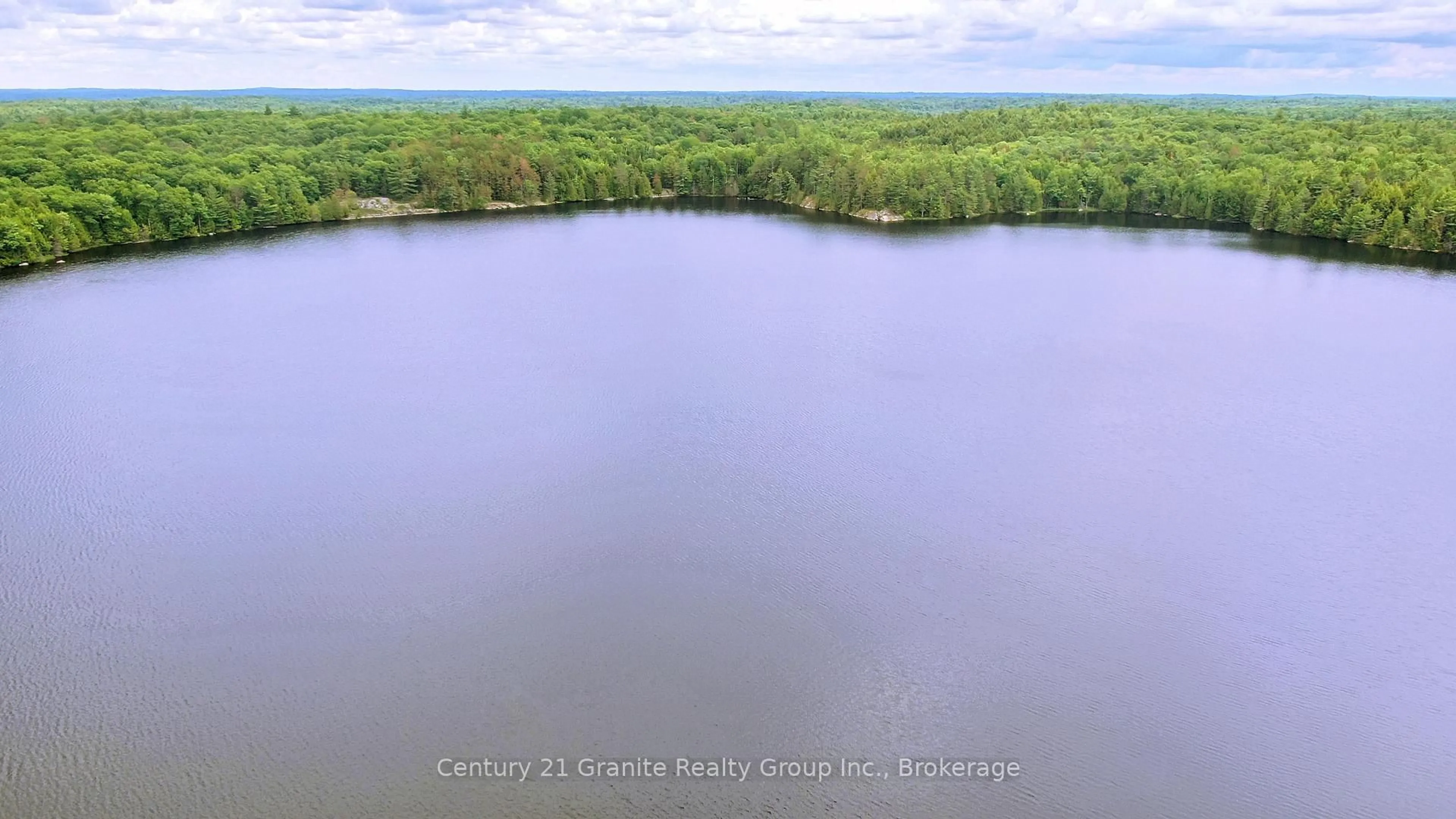 A pic from outside/outdoor area/front of a property/back of a property/a pic from drone, water/lake/river/ocean view for 0 West Eels Lake Rd, North Kawartha Ontario K0L 1A0