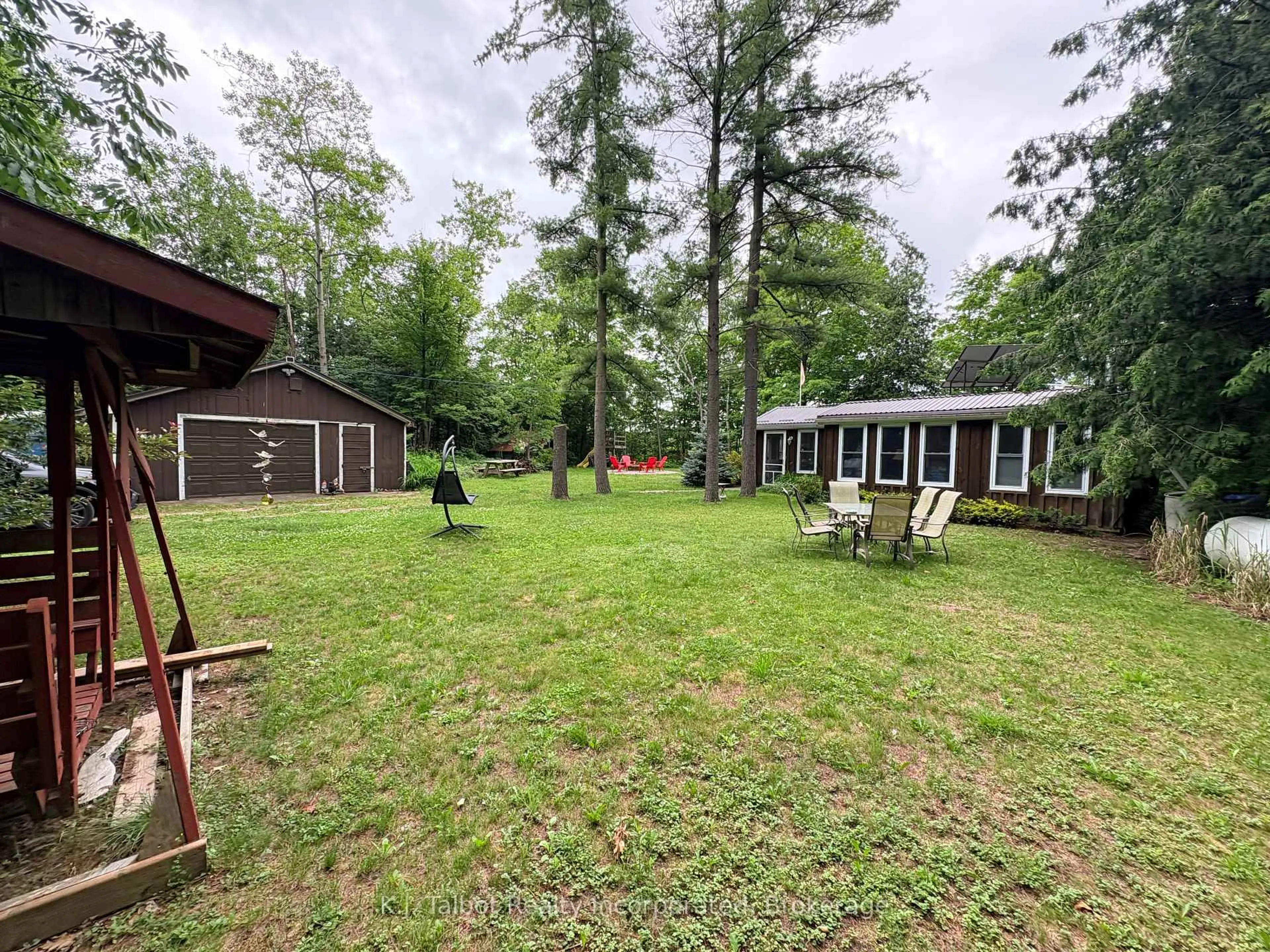 A pic from outside/outdoor area/front of a property/back of a property/a pic from drone, forest/trees view for 81001 Falls Rd, Central Huron Ontario N7A 3X8