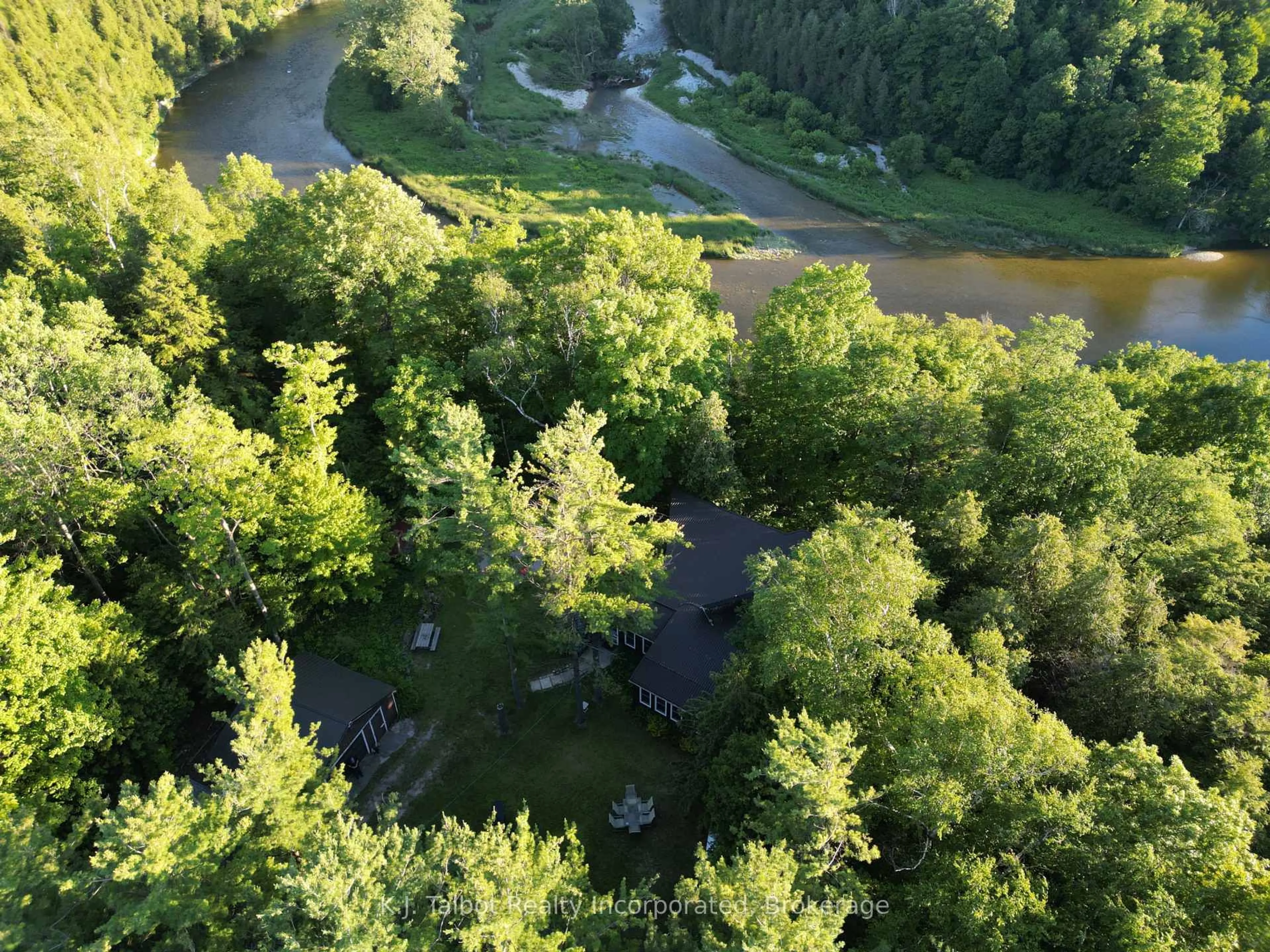 A pic from outside/outdoor area/front of a property/back of a property/a pic from drone, forest/trees view for 81001 Falls Rd, Central Huron Ontario N7A 3X8