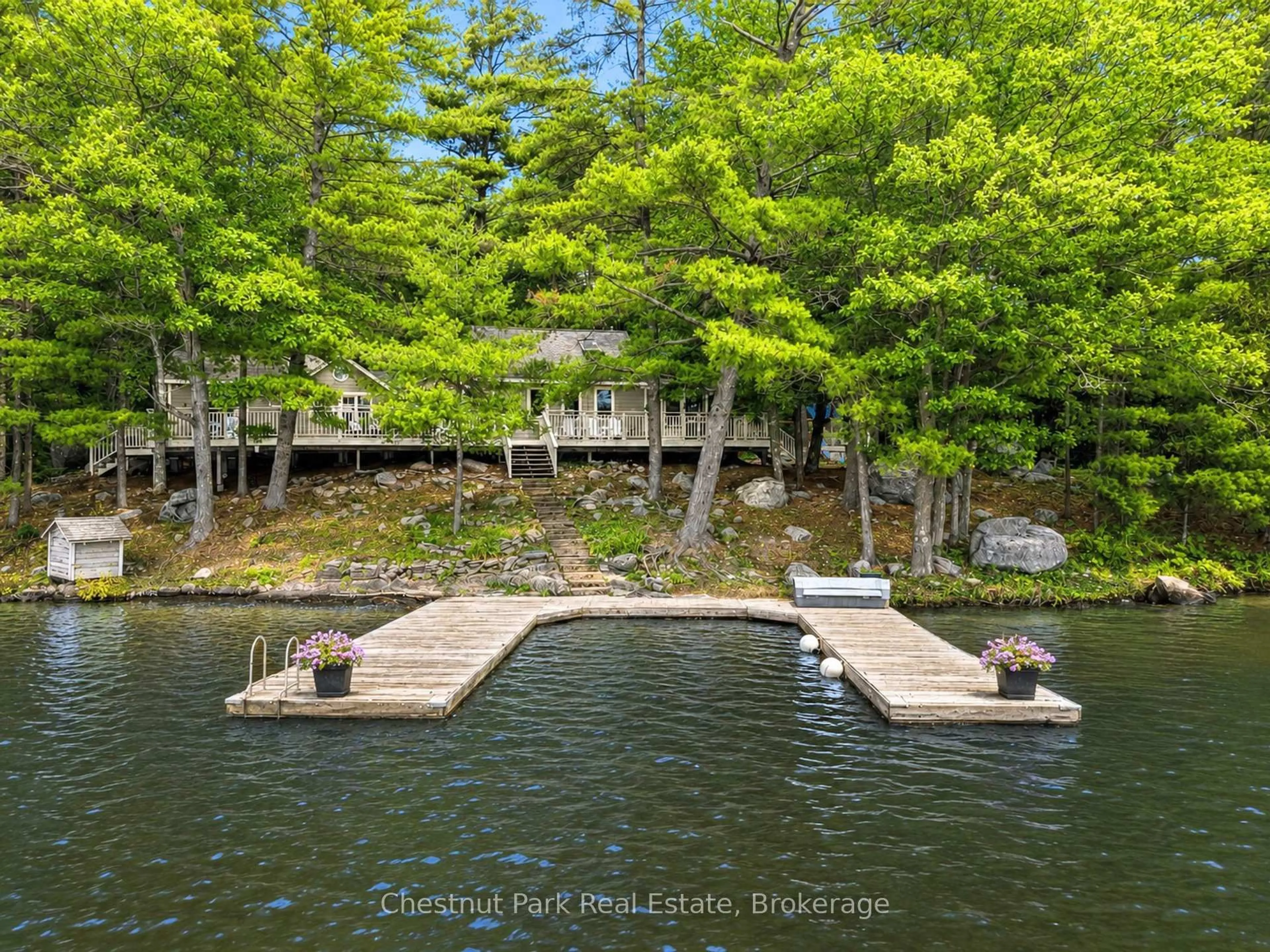 A pic from outside/outdoor area/front of a property/back of a property/a pic from drone, water/lake/river/ocean view for 51 Taylor Island, Gravenhurst Ontario P1P 1R2