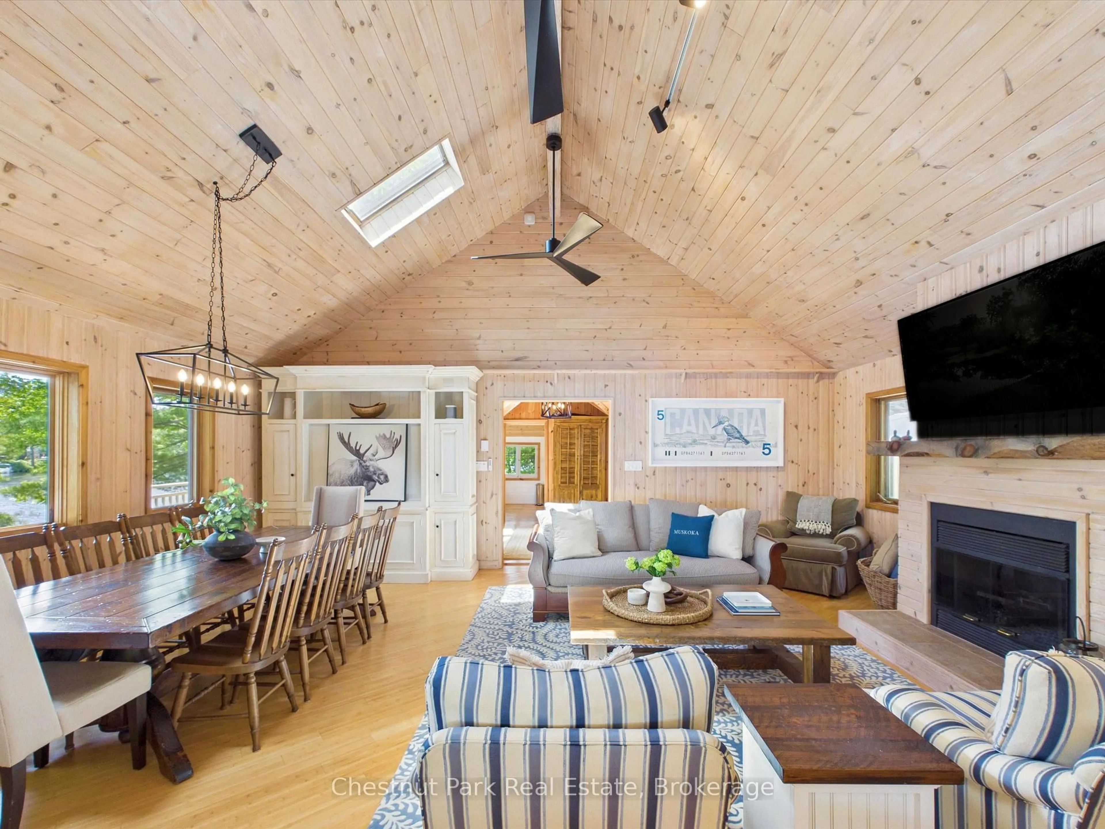 Living room with furniture, wood/laminate floor for 51 Taylor Island, Gravenhurst Ontario P1P 1R2