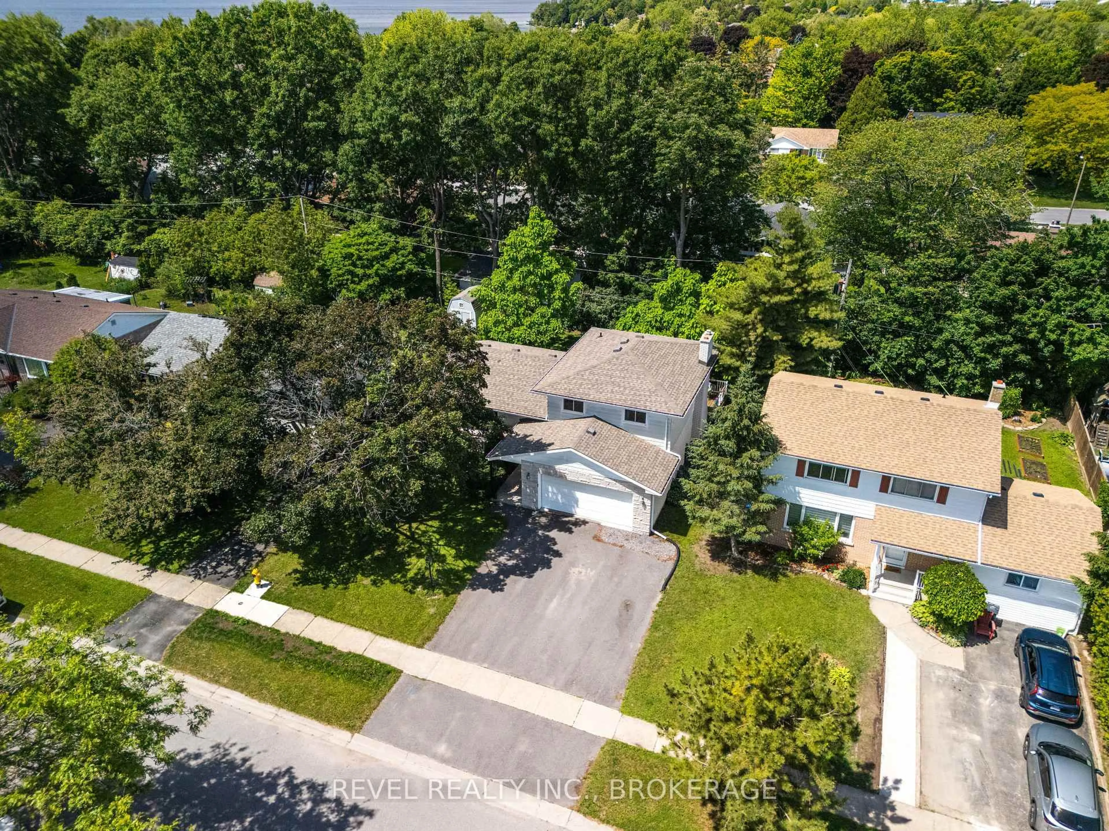 A pic from outside/outdoor area/front of a property/back of a property/a pic from drone, water/lake/river/ocean view for 163 Braemar Rd, Kingston Ontario K7M 4B7