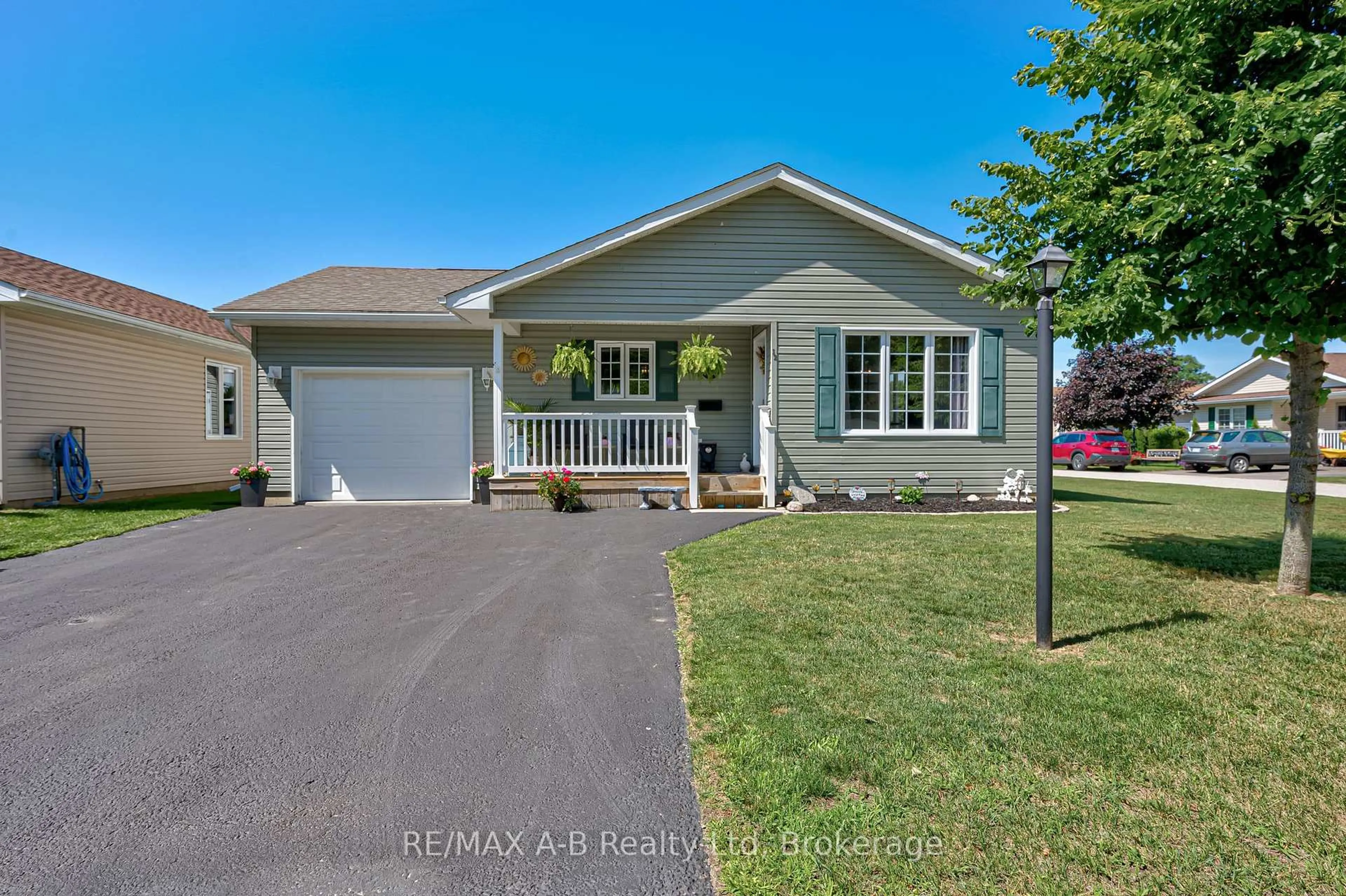 Home with vinyl exterior material, street for 12 Kellestine Dr, Strathroy-Caradoc Ontario N7G 0C5