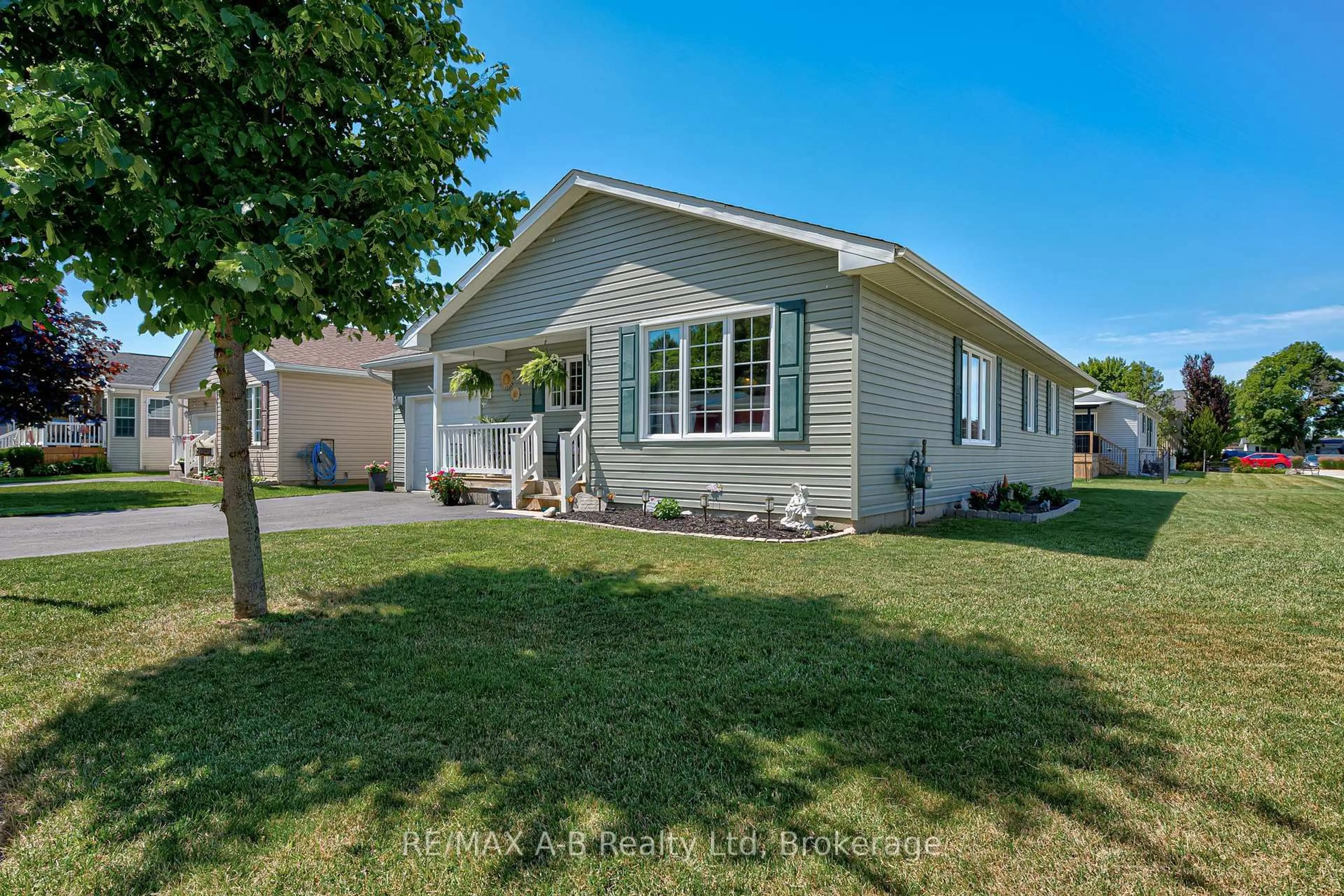 Home with vinyl exterior material, street for 12 Kellestine Dr, Strathroy-Caradoc Ontario N7G 0C5