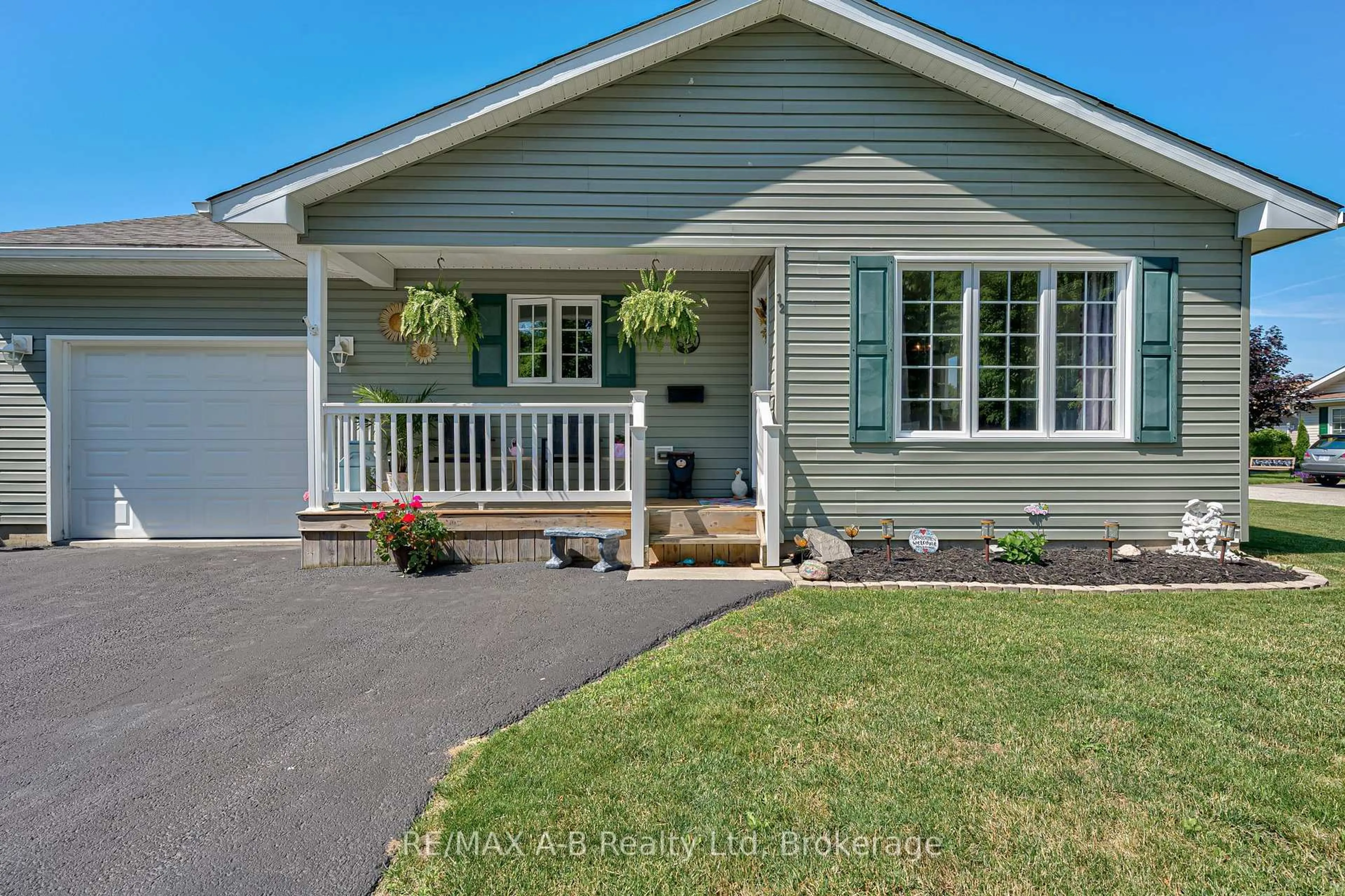 Home with vinyl exterior material, street for 12 Kellestine Dr, Strathroy-Caradoc Ontario N7G 0C5
