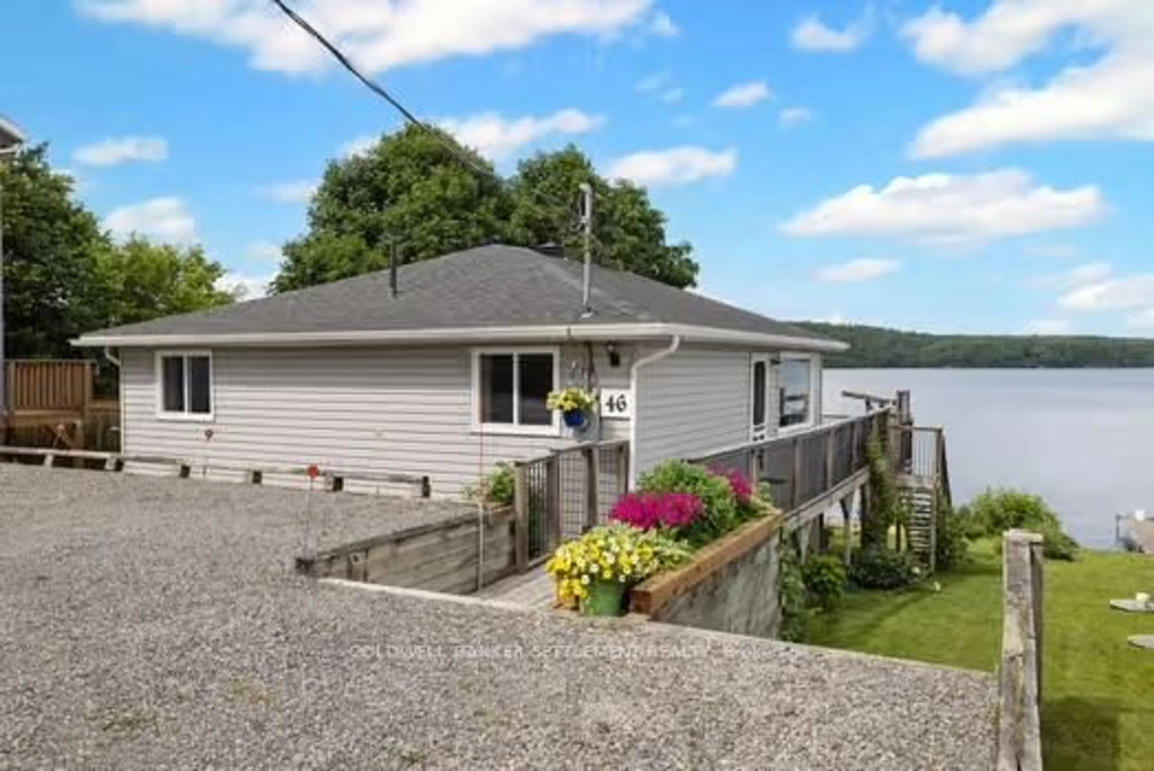 A pic from outside/outdoor area/front of a property/back of a property/a pic from drone, water/lake/river/ocean view for 46 Mulville Bay Lane, Westport Ontario K0G 1X0