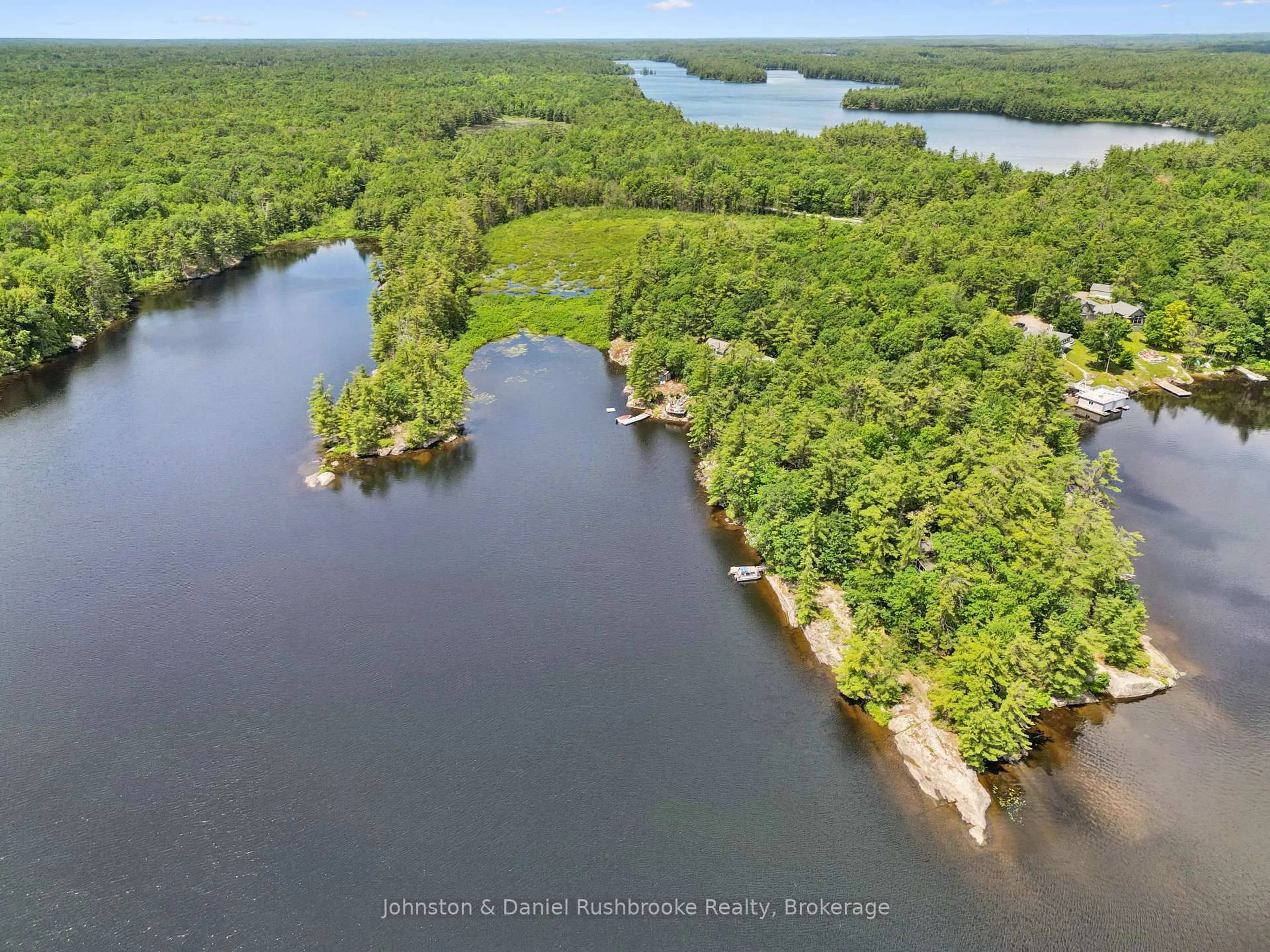 A pic from outside/outdoor area/front of a property/back of a property/a pic from drone, water/lake/river/ocean view for 1037 Sniders Bay Rd #3, Gravenhurst Ontario P1P 1R2