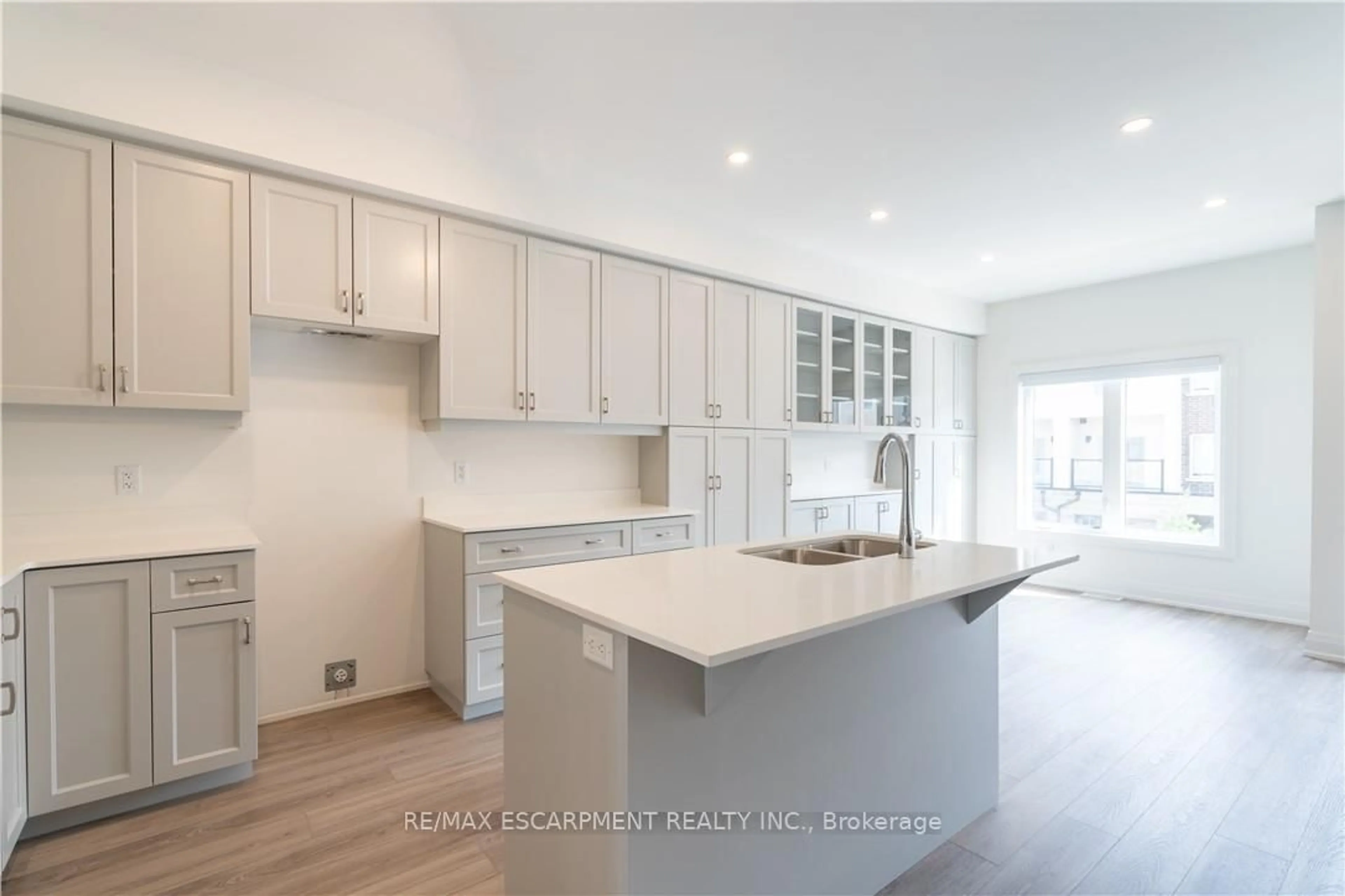 Open concept kitchen, unknown for 15 Raspberry Lane, Hamilton Ontario L0R 1W0
