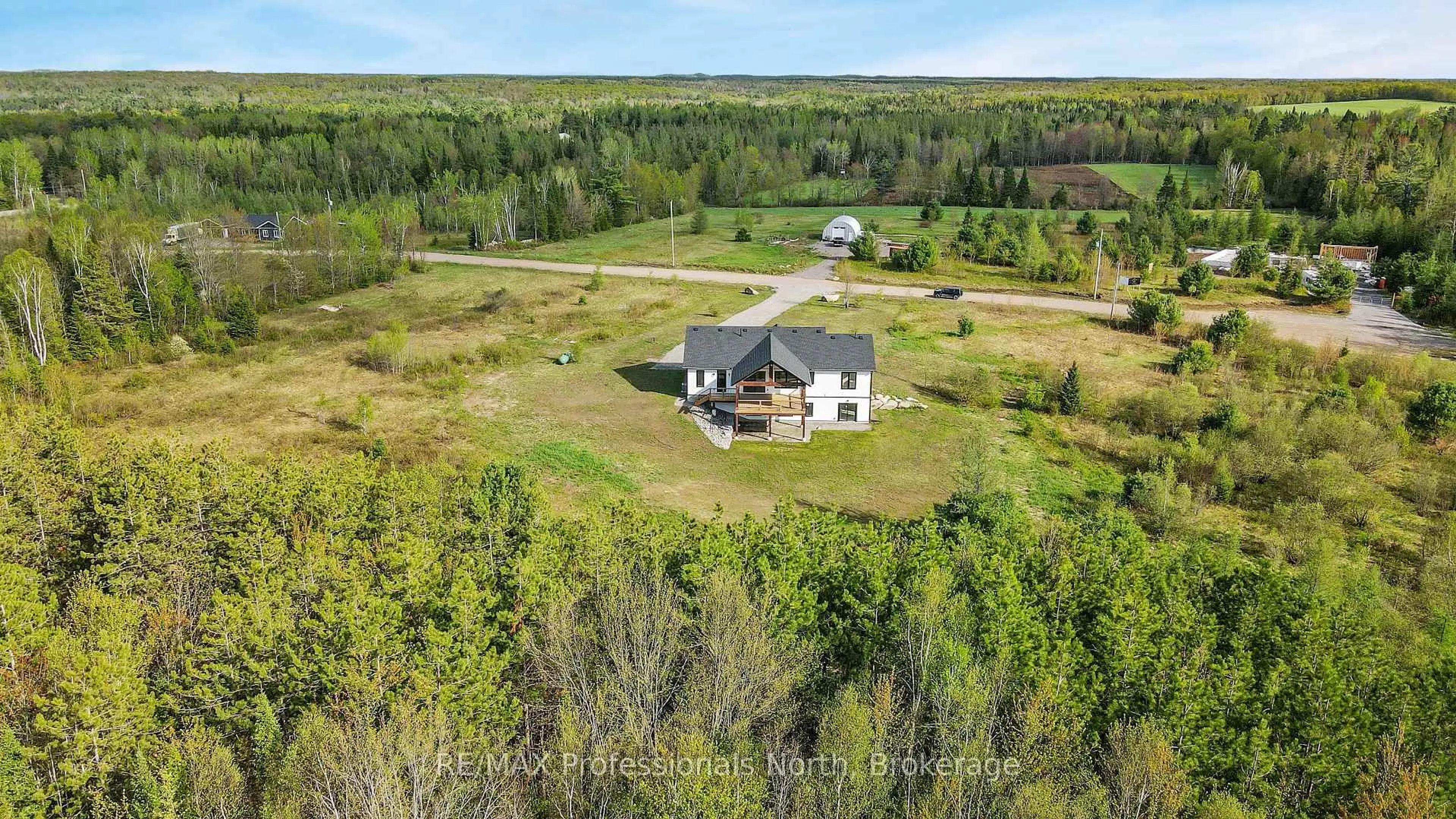 A pic from outside/outdoor area/front of a property/back of a property/a pic from drone, unknown for 1058 Piper Glen Rd, Minden Hills Ontario K0M 2K0