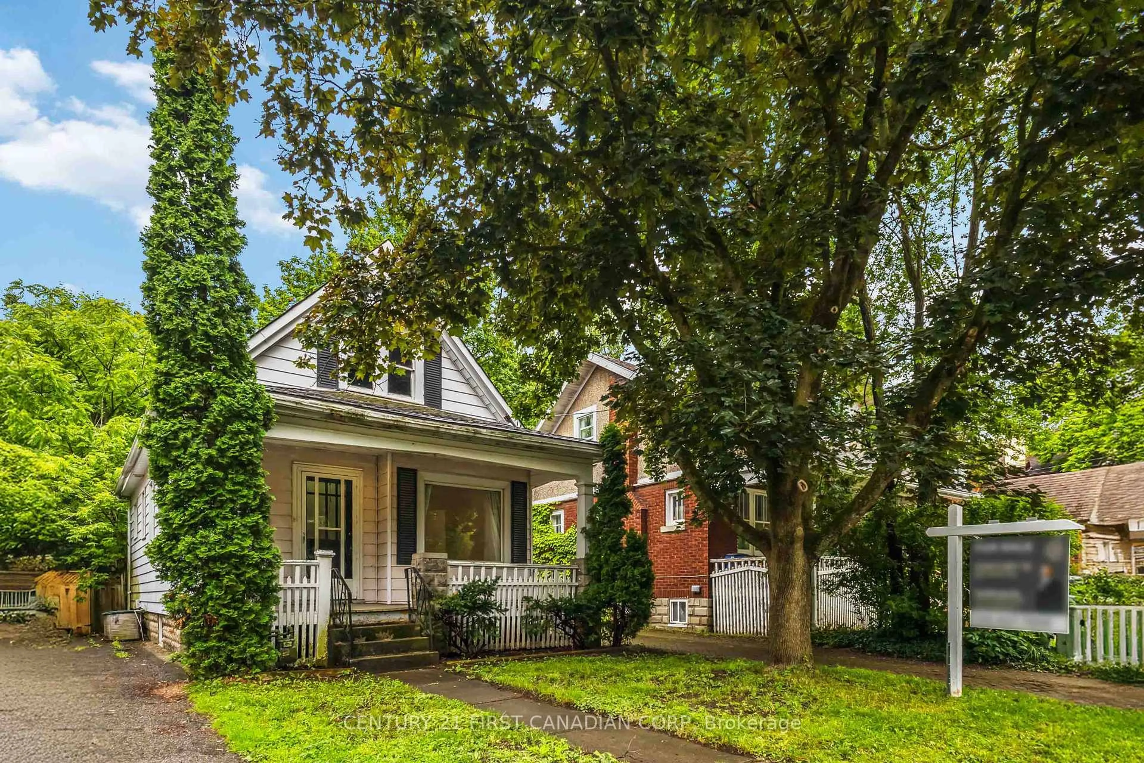 Home with brick exterior material, street for 215 Bernard Ave, London East Ontario N6A 2M9