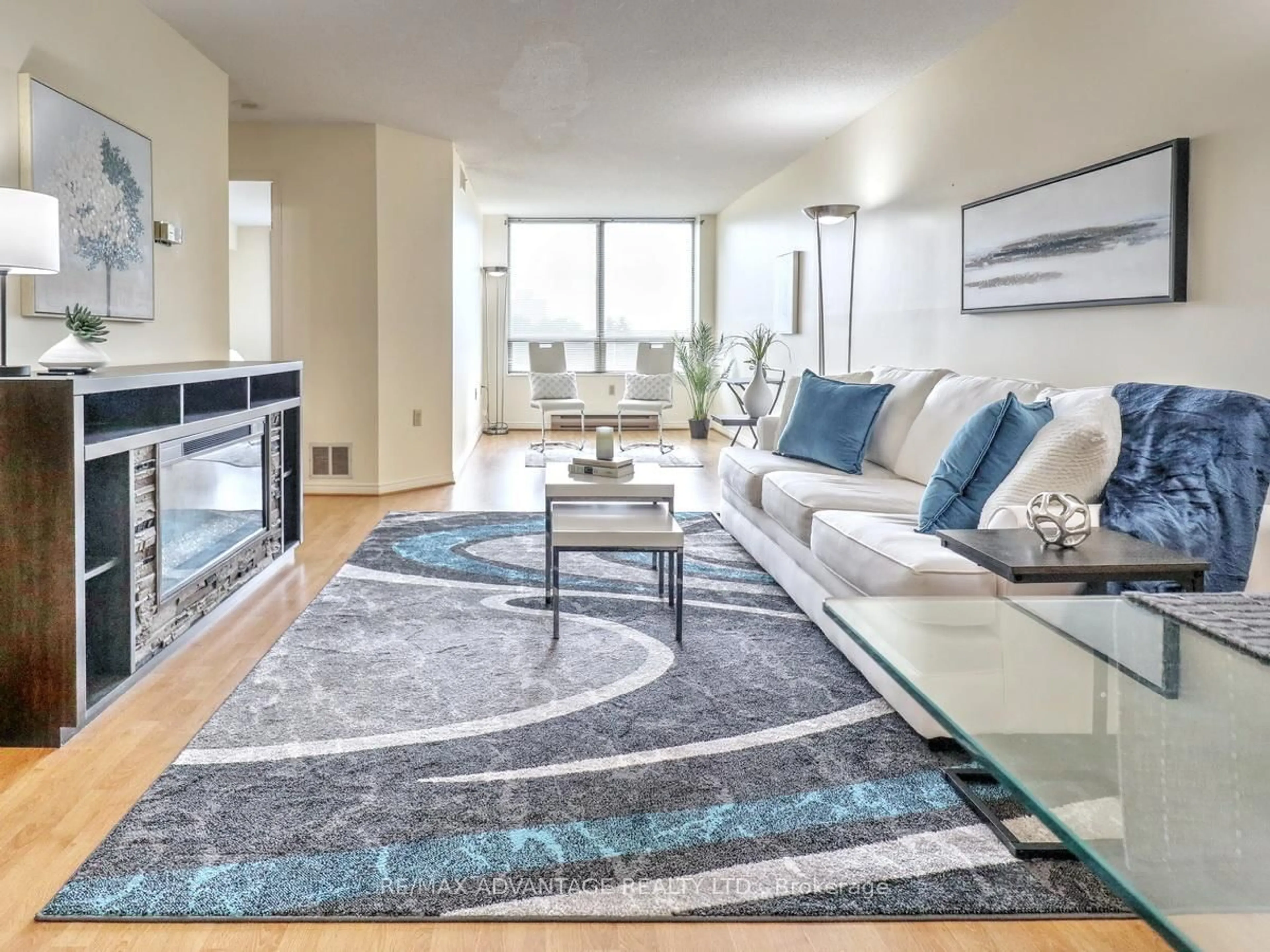 Living room with furniture, carpet floor for 695 Richmond St #304, London East Ontario N6A 5M8