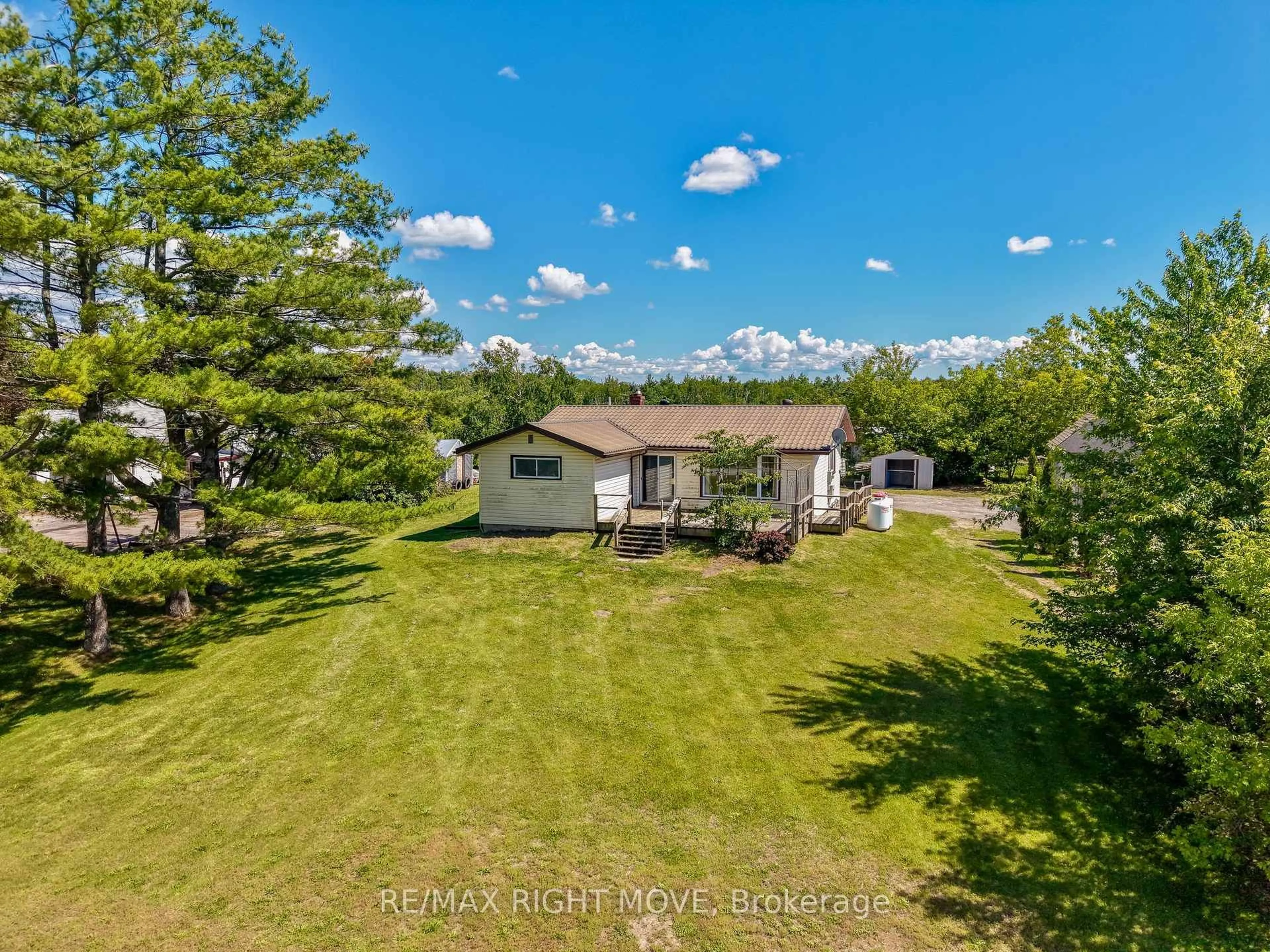 A pic from outside/outdoor area/front of a property/back of a property/a pic from drone, water/lake/river/ocean view for 944 Portage Rd, Kawartha Lakes Ontario K0M 2B0