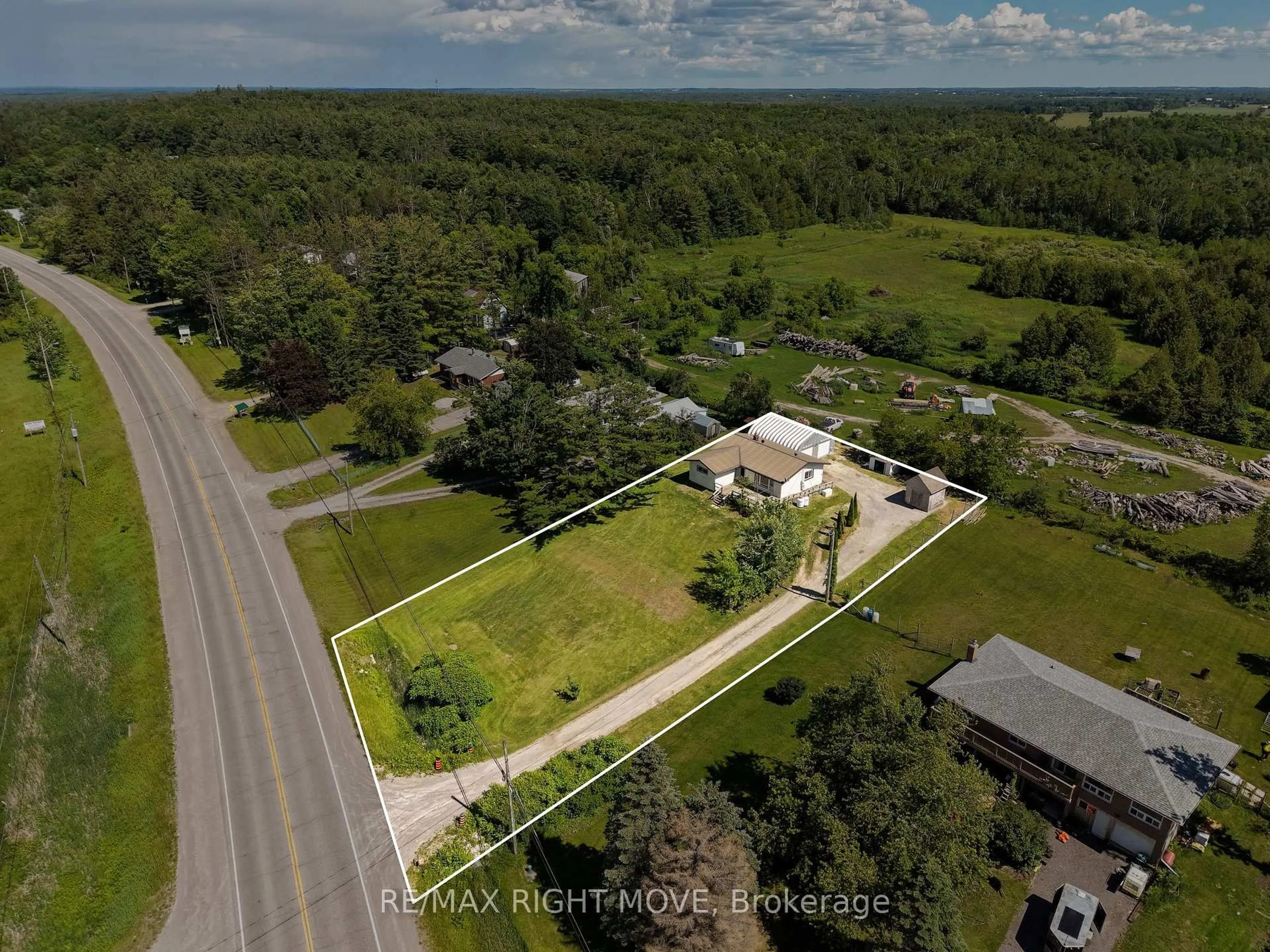 A pic from outside/outdoor area/front of a property/back of a property/a pic from drone, water/lake/river/ocean view for 944 Portage Rd, Kawartha Lakes Ontario K0M 2B0