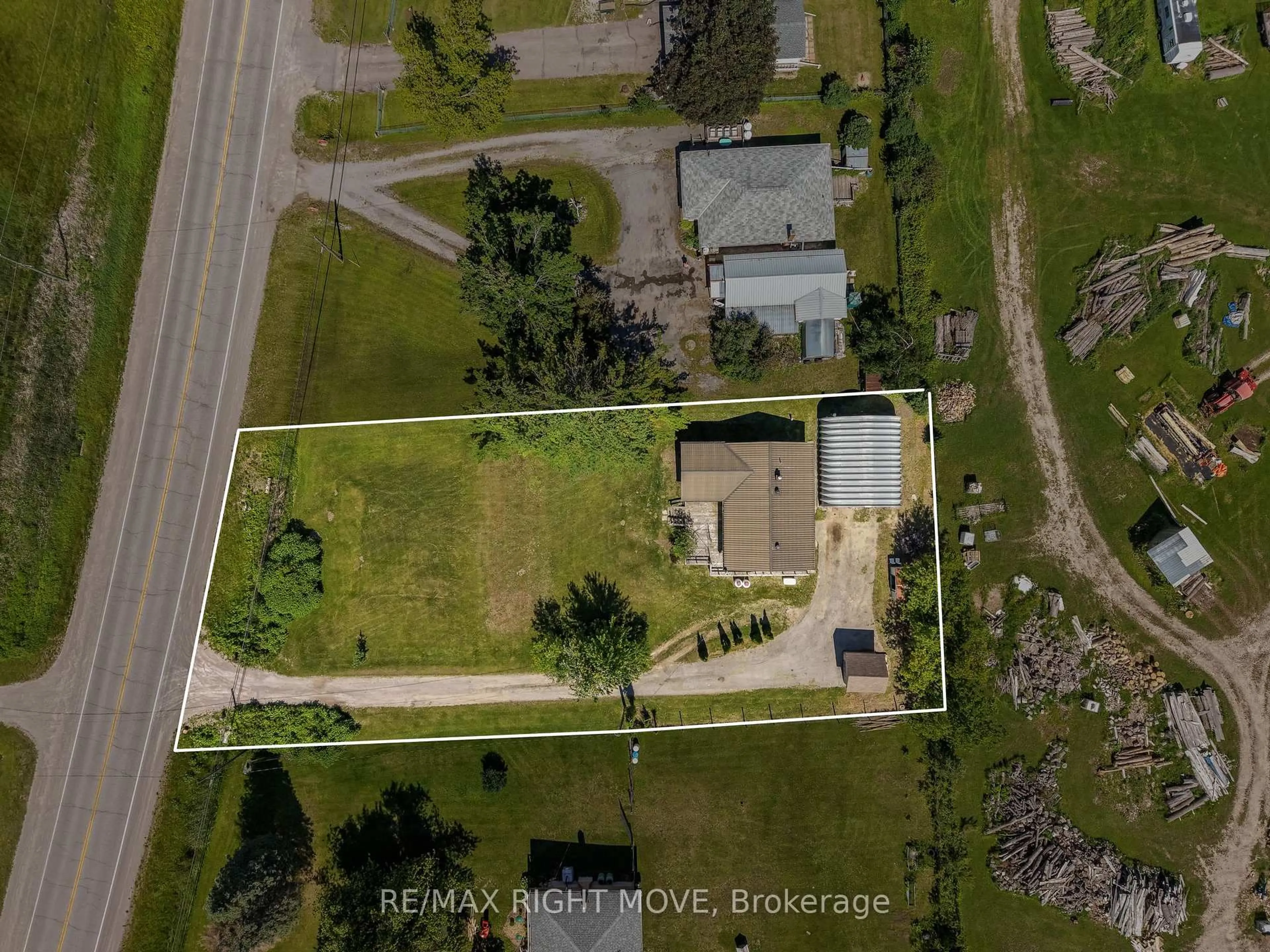 A pic from outside/outdoor area/front of a property/back of a property/a pic from drone, street for 944 Portage Rd, Kawartha Lakes Ontario K0M 2B0