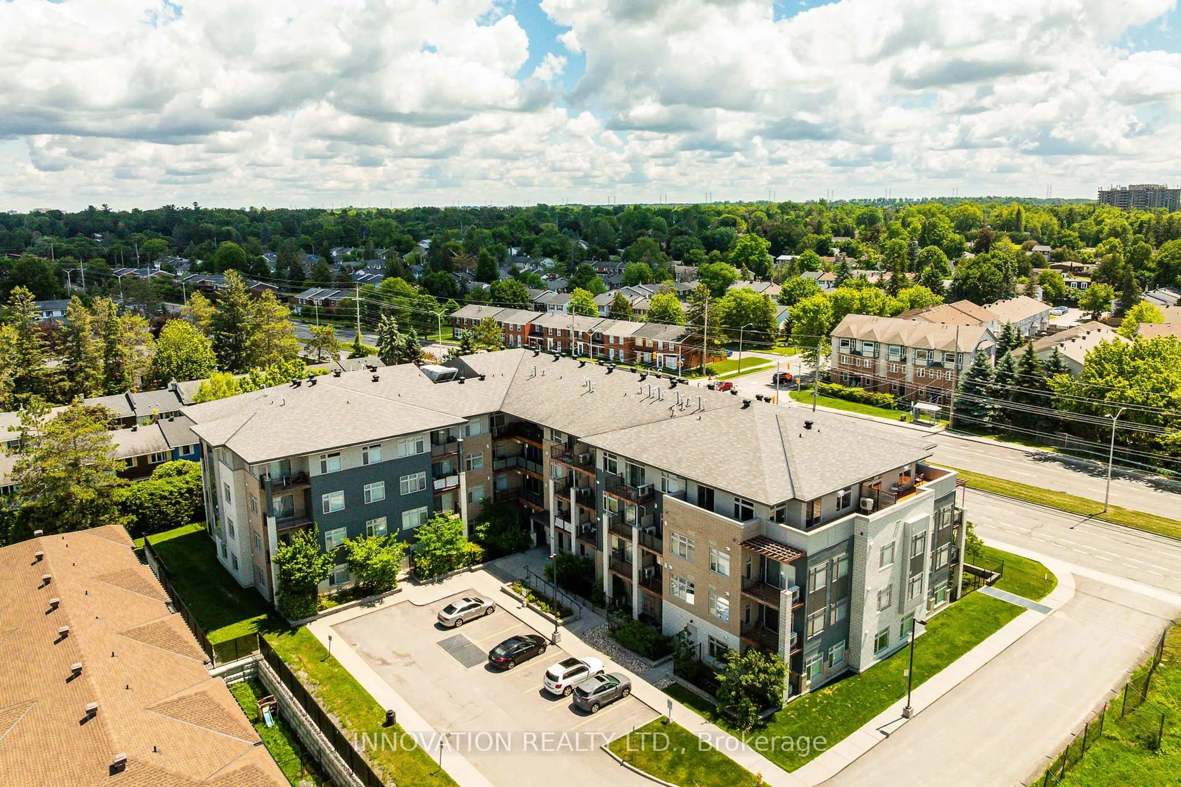 A pic from outside/outdoor area/front of a property/back of a property/a pic from drone, unknown for 2785 Baseline Rd #311, Ottawa Ontario K2H 0B7