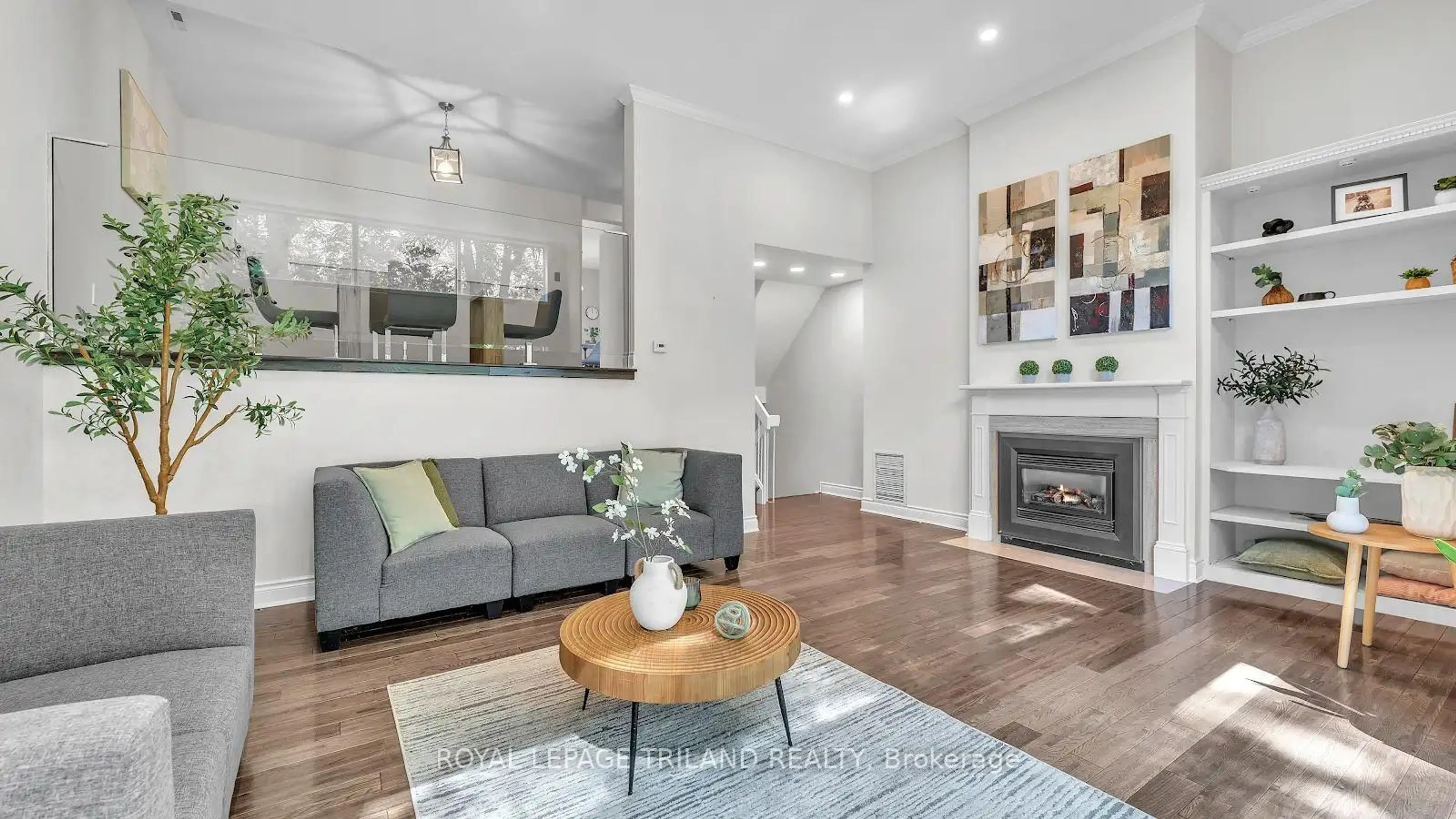 Living room with furniture, wood/laminate floor for 703 Windermere Rd #9, London North Ontario N5X 2P1
