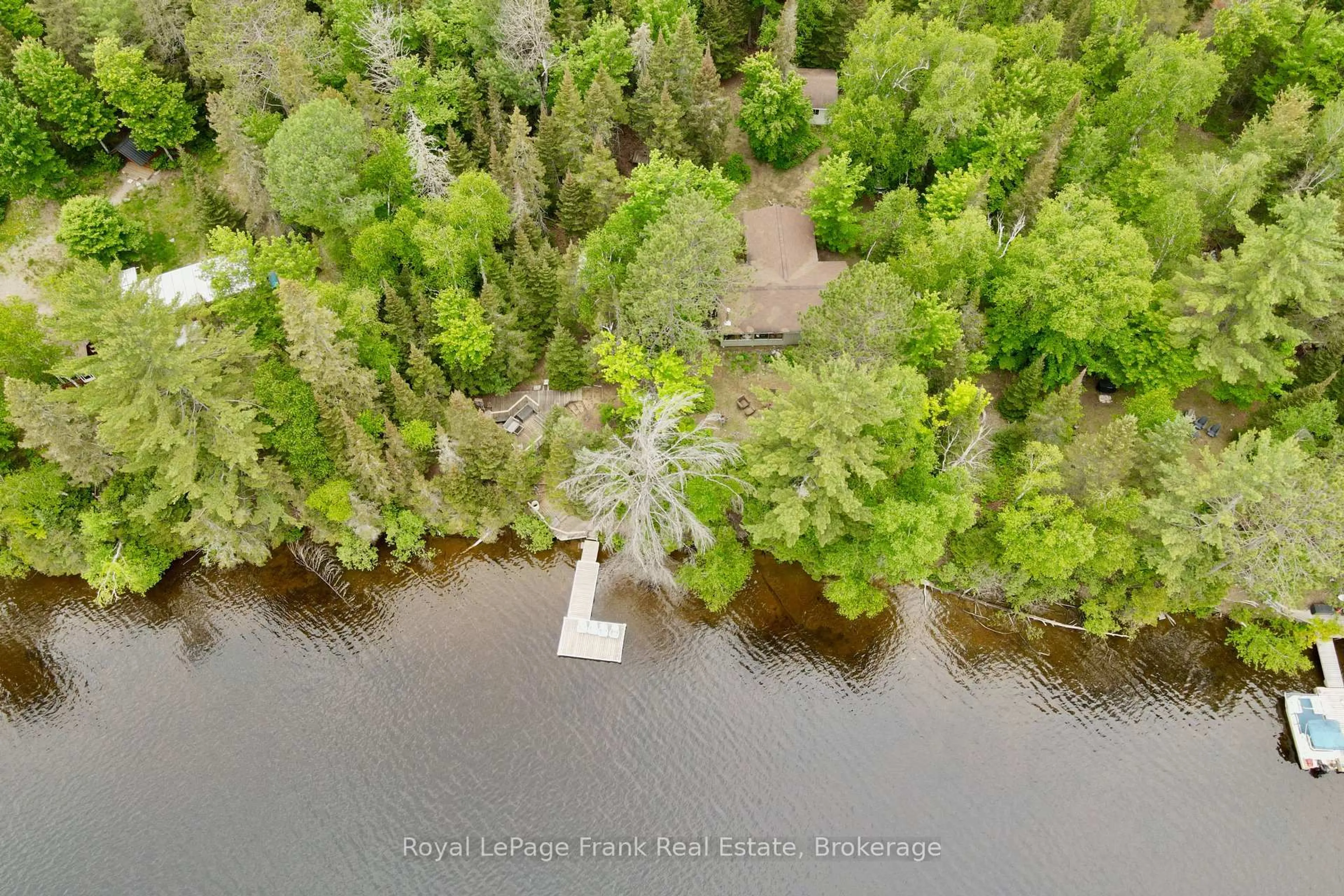 A pic from outside/outdoor area/front of a property/back of a property/a pic from drone, water/lake/river/ocean view for 554A South McKenzie Lake Rd, South Algonquin Ontario K0L 2K0