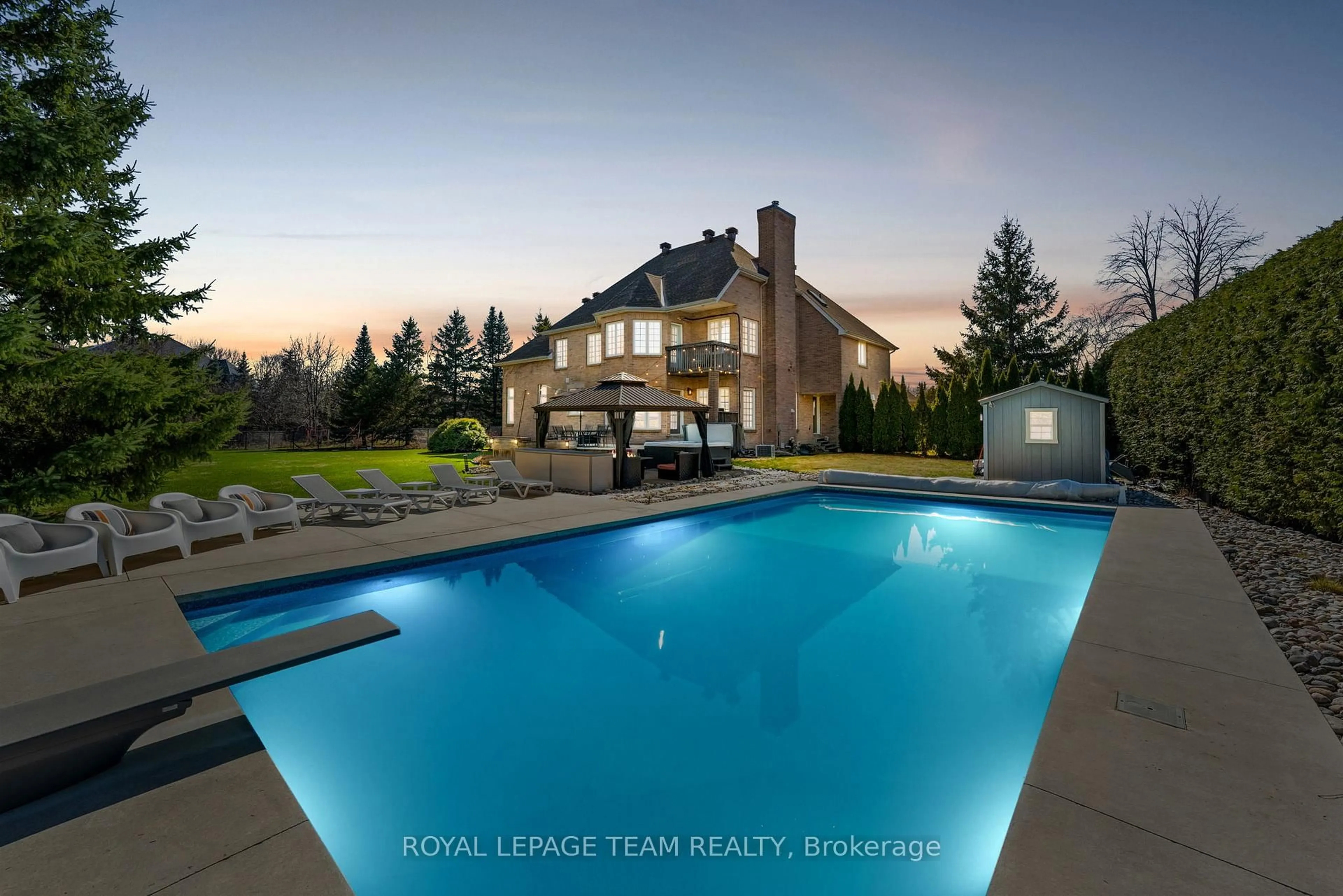 A pic from outside/outdoor area/front of a property/back of a property/a pic from drone, water/lake/river/ocean view for 1342 Revell Dr, Manotick Ontario K4M 1K8