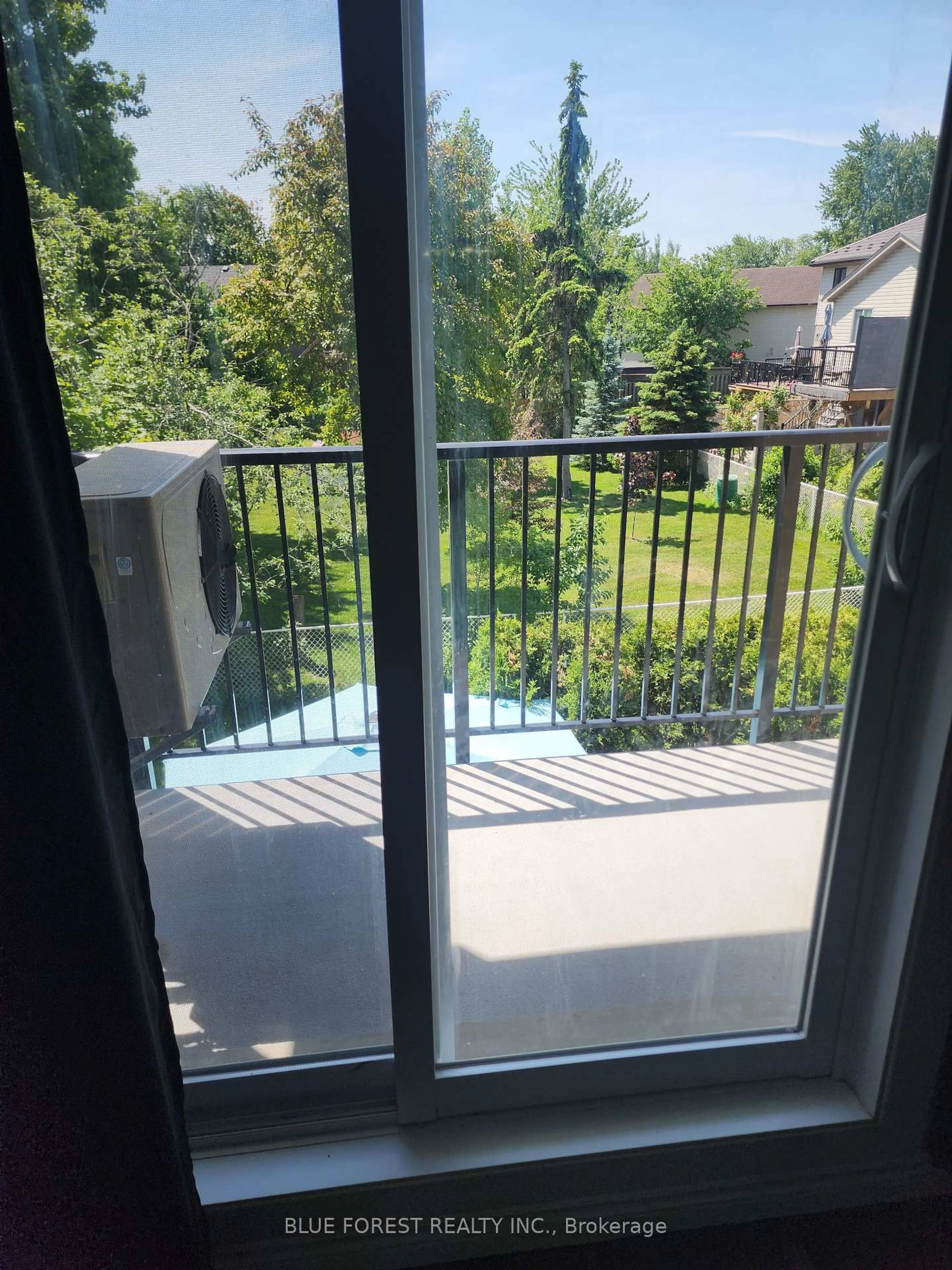 Balcony in the apartment, city buildings view from balcony for 727 Deveron Cres #210, London South Ontario N5Z 4X4