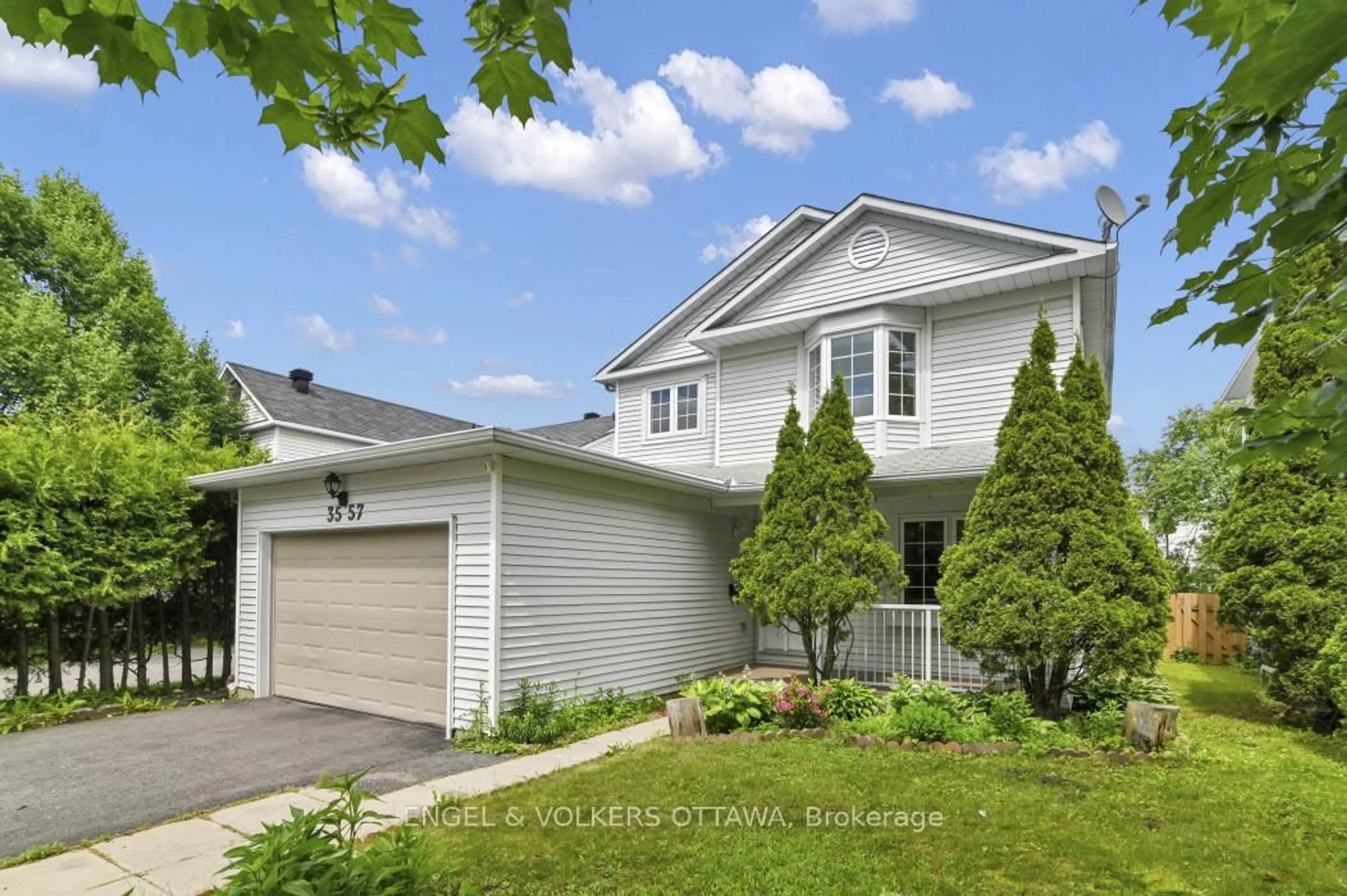 Home with vinyl exterior material, street for 3557 Trappers Rd, Ottawa Ontario K1T 2R1