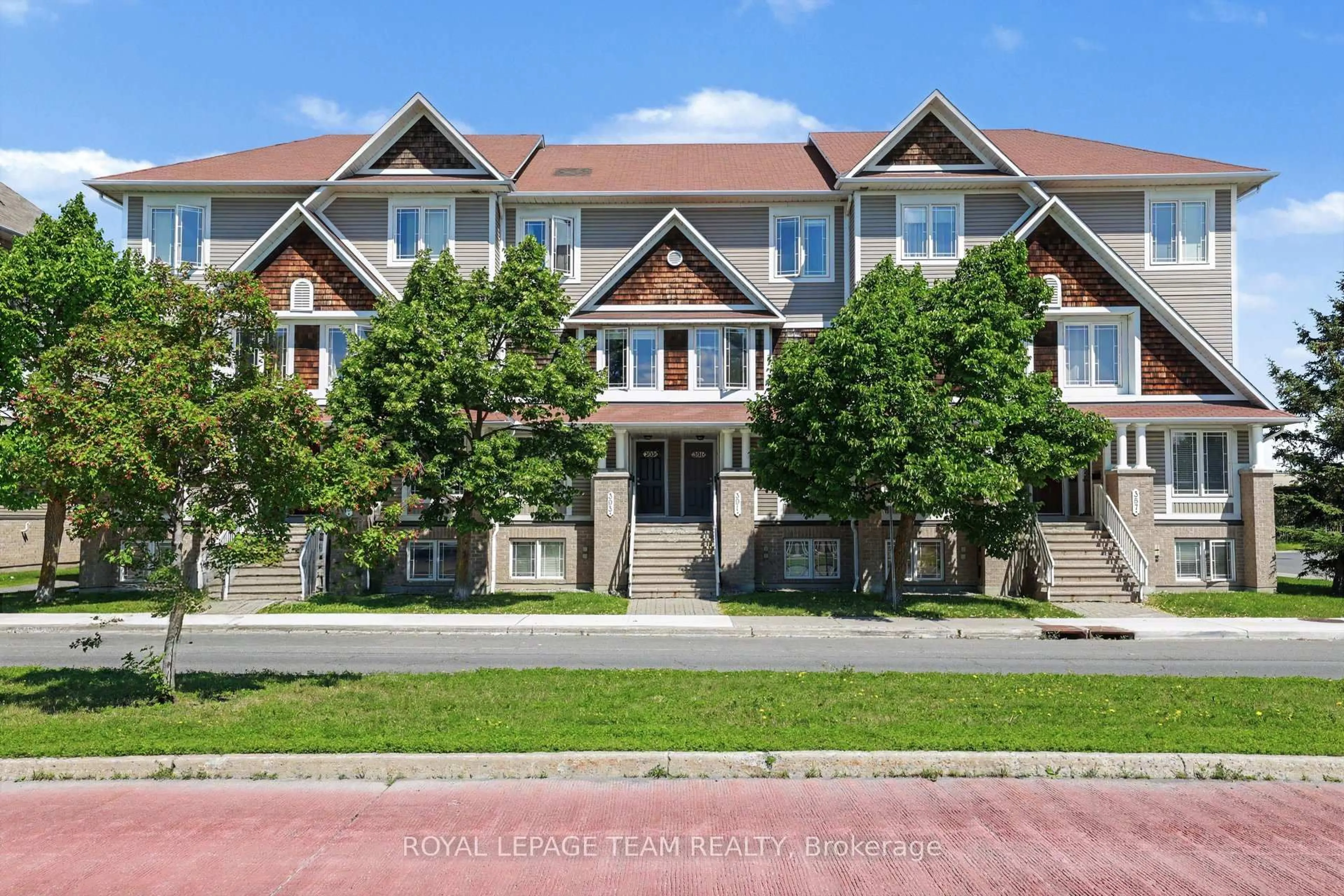 A pic from outside/outdoor area/front of a property/back of a property/a pic from drone, street for 391 Chapman Mills Dr #A, Ottawa Ontario K2J 0M7