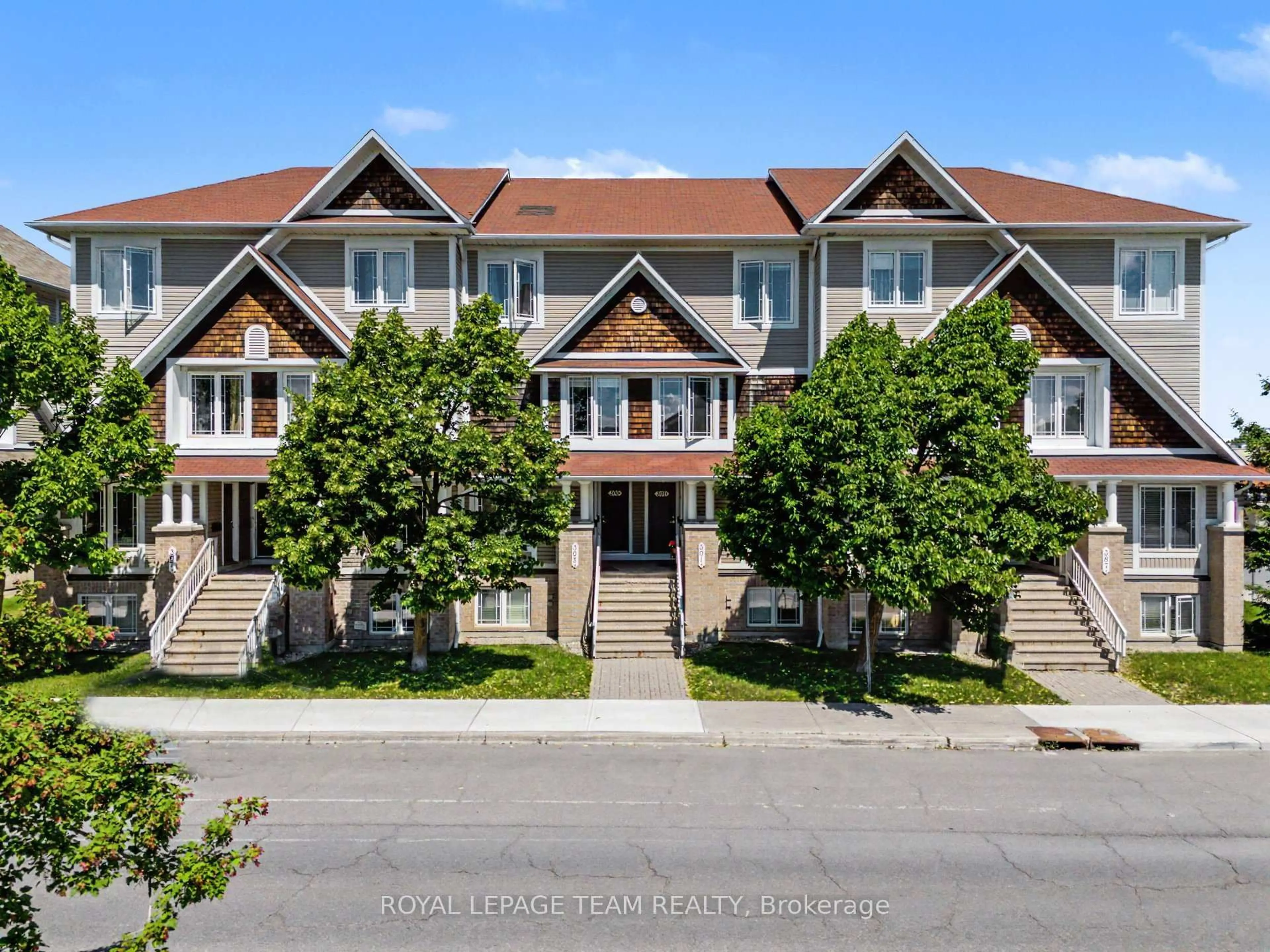 A pic from outside/outdoor area/front of a property/back of a property/a pic from drone, street for 391 Chapman Mills Dr #A, Ottawa Ontario K2J 0M7