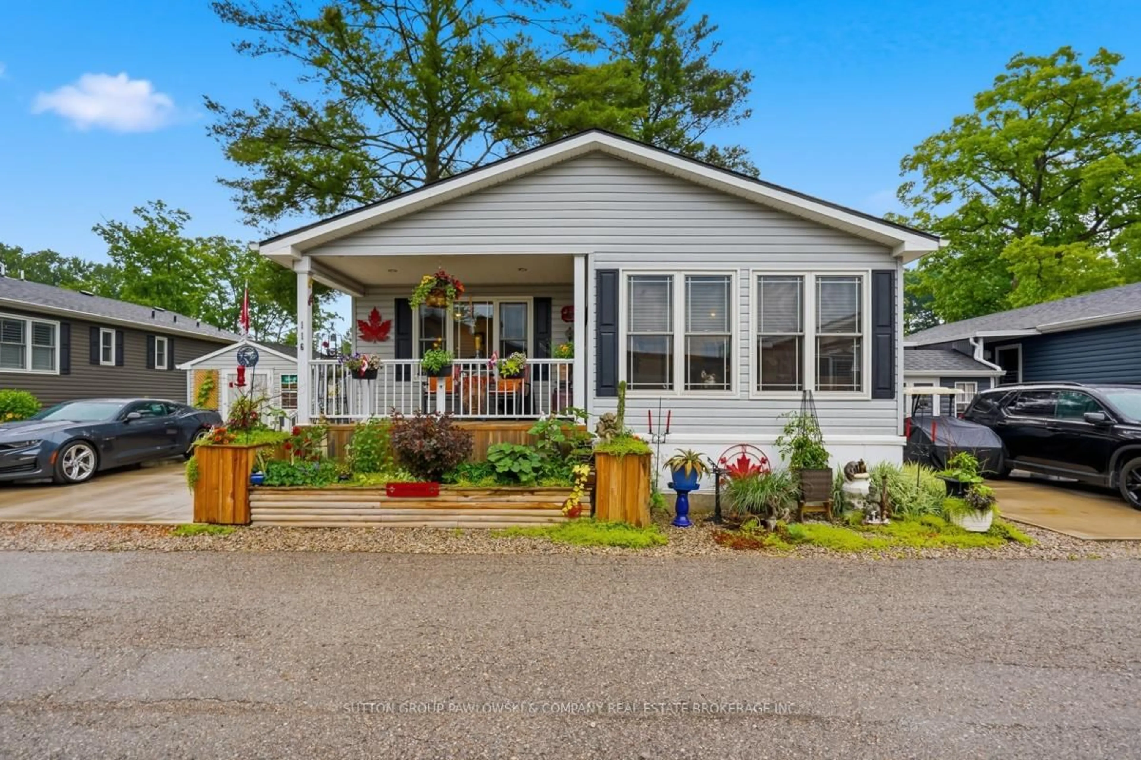 Home with vinyl exterior material, street for 22790 Amiens Rd #116, Middlesex Centre Ontario N0L 1R0