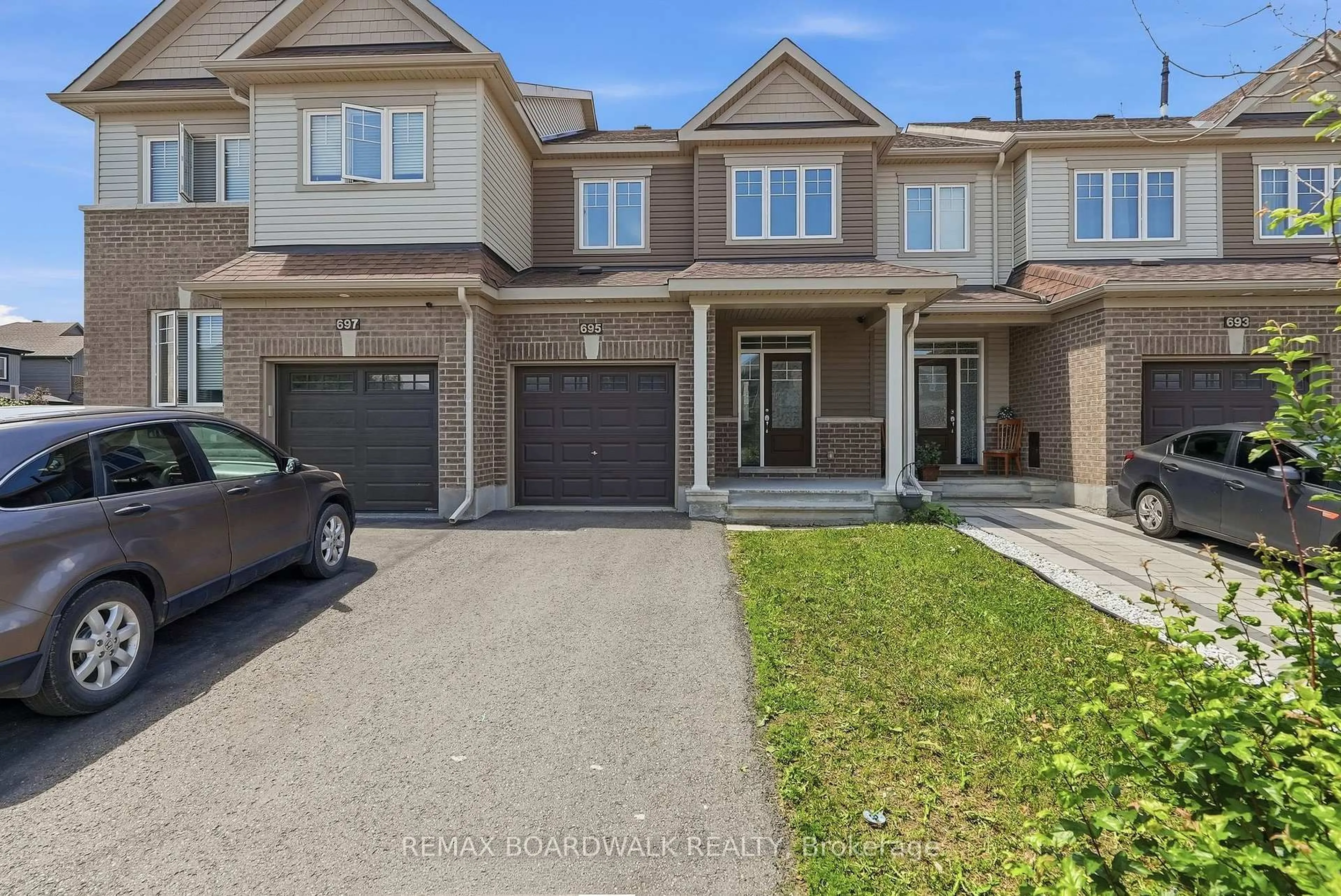 Home with brick exterior material, street for 695 Jerome Jodoin Dr, Ottawa Ontario K4A 1G8