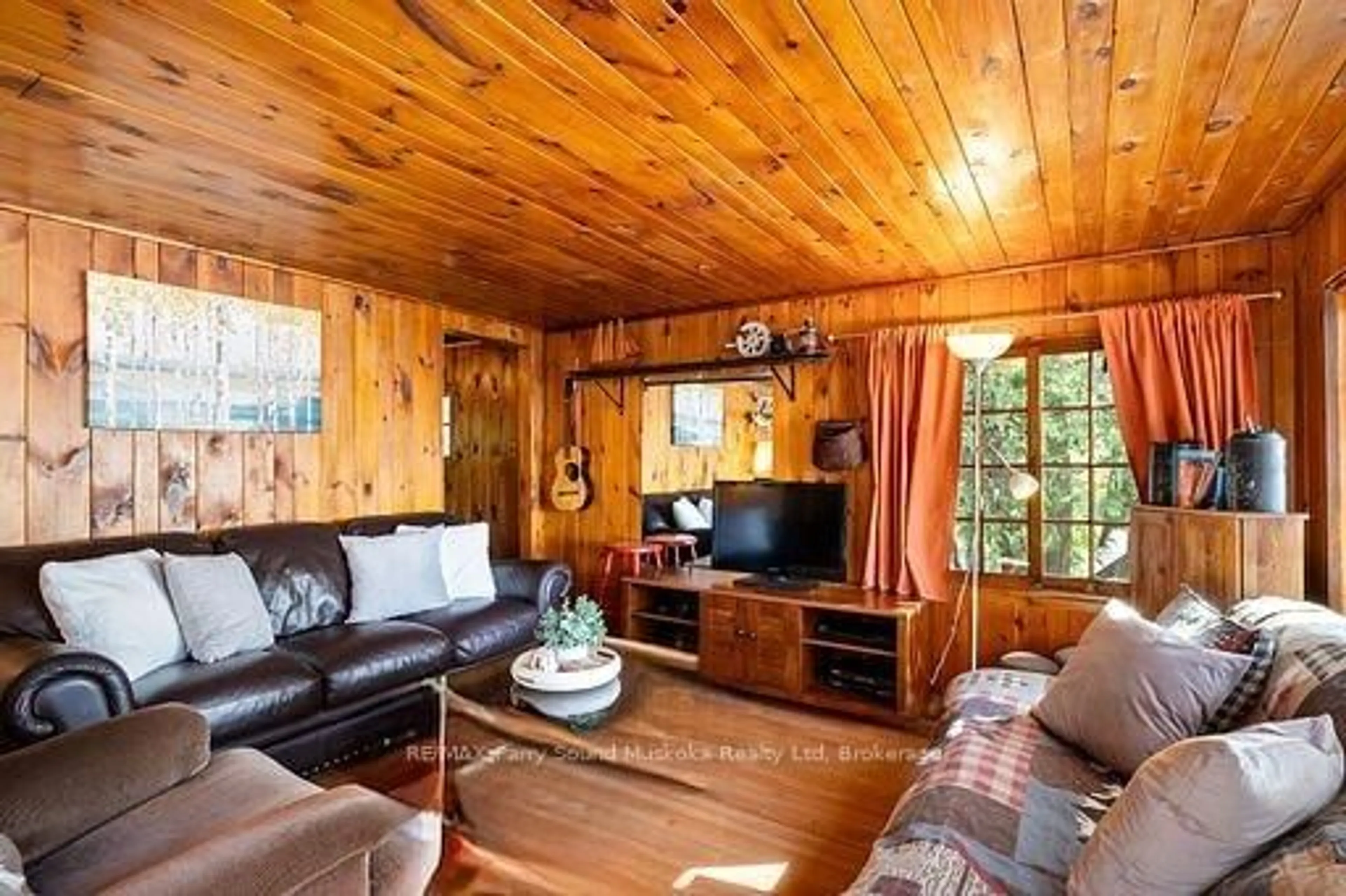 Living room with furniture, wood/laminate floor for 764 EAST BEAR LAKE Rd, McMurrich/Monteith Ontario P0A 1Y0