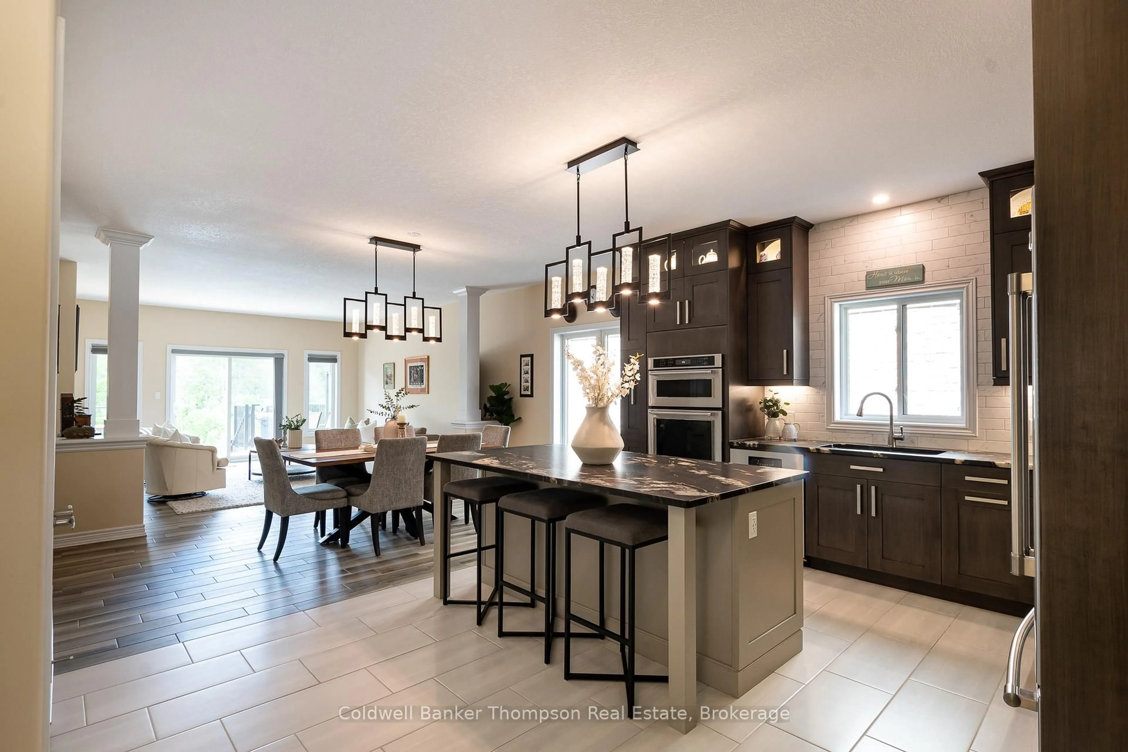 Open concept kitchen, ceramic/tile floor for 63 Selkirk Dr, Huntsville Ontario P1H 0C6