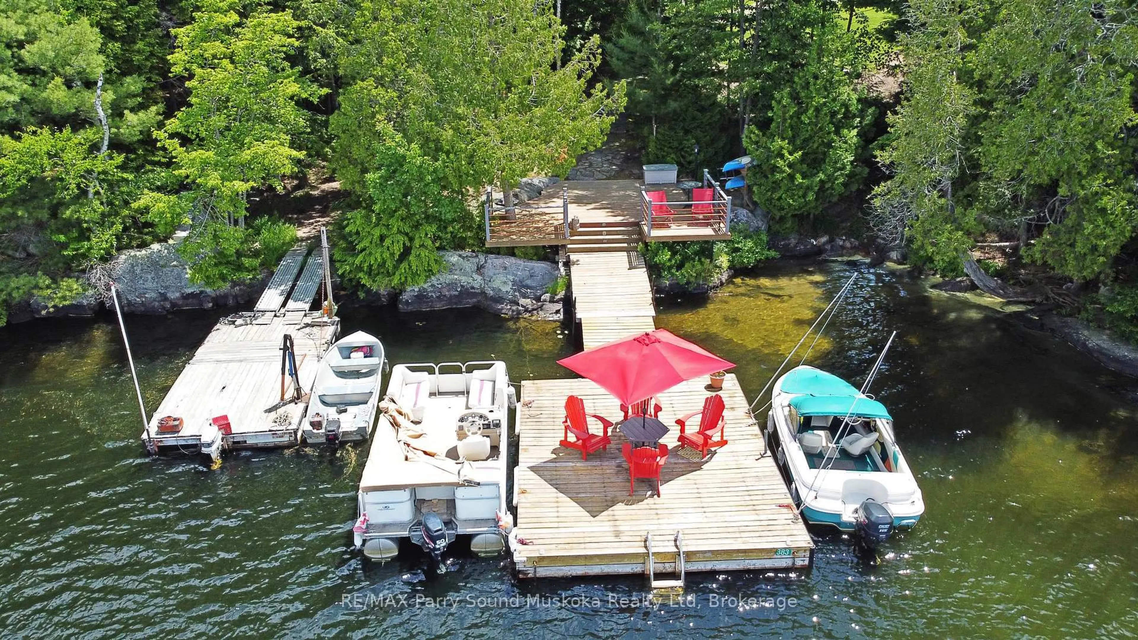 A pic from outside/outdoor area/front of a property/back of a property/a pic from drone, water/lake/river/ocean view for 383 Horseshoe Lake WA, Seguin Ontario P2A 2W8