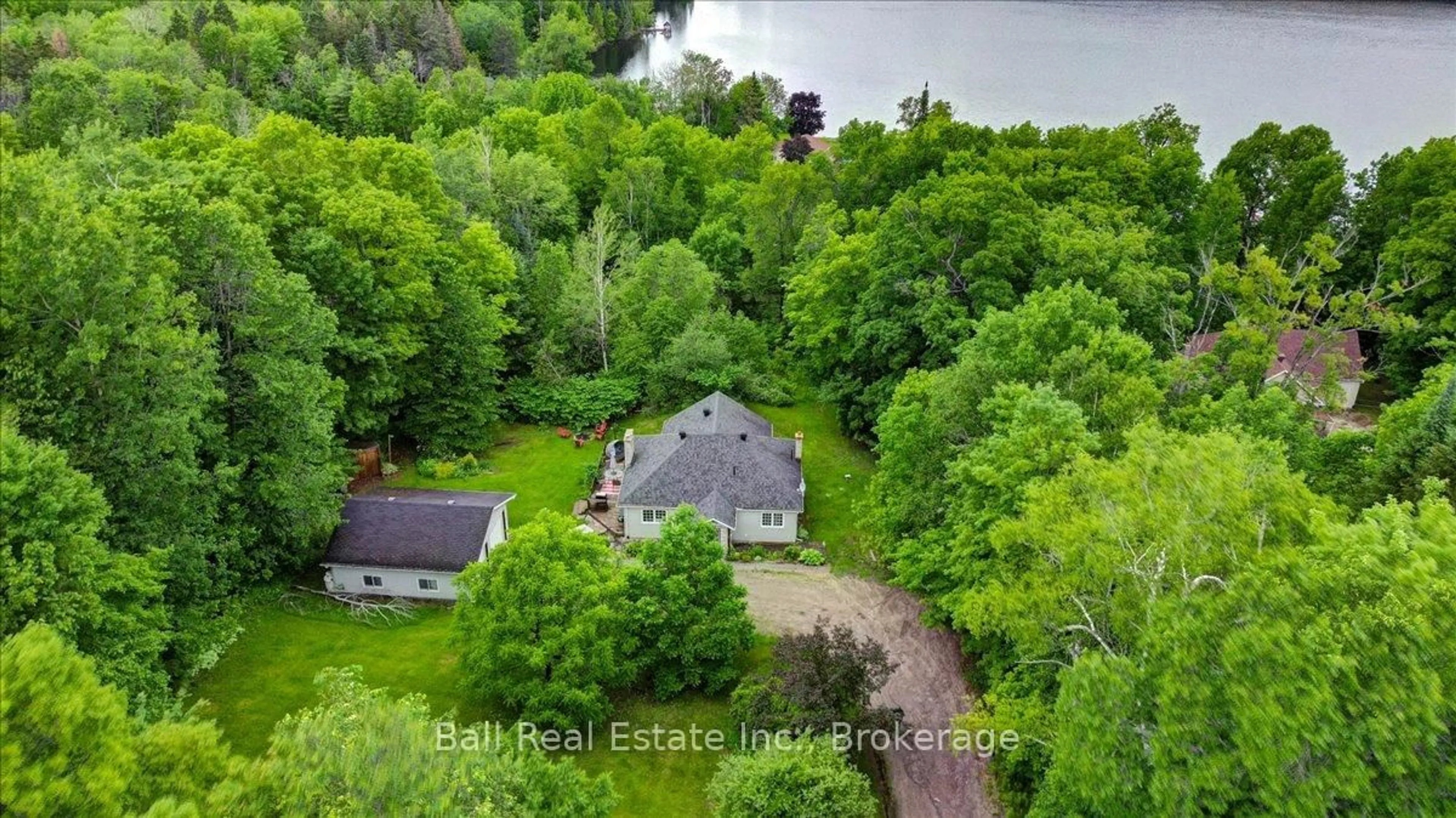 A pic from outside/outdoor area/front of a property/back of a property/a pic from drone, water/lake/river/ocean view for 1482 South Baptiste Lake Rd, Bancroft Ontario K0L 1C0