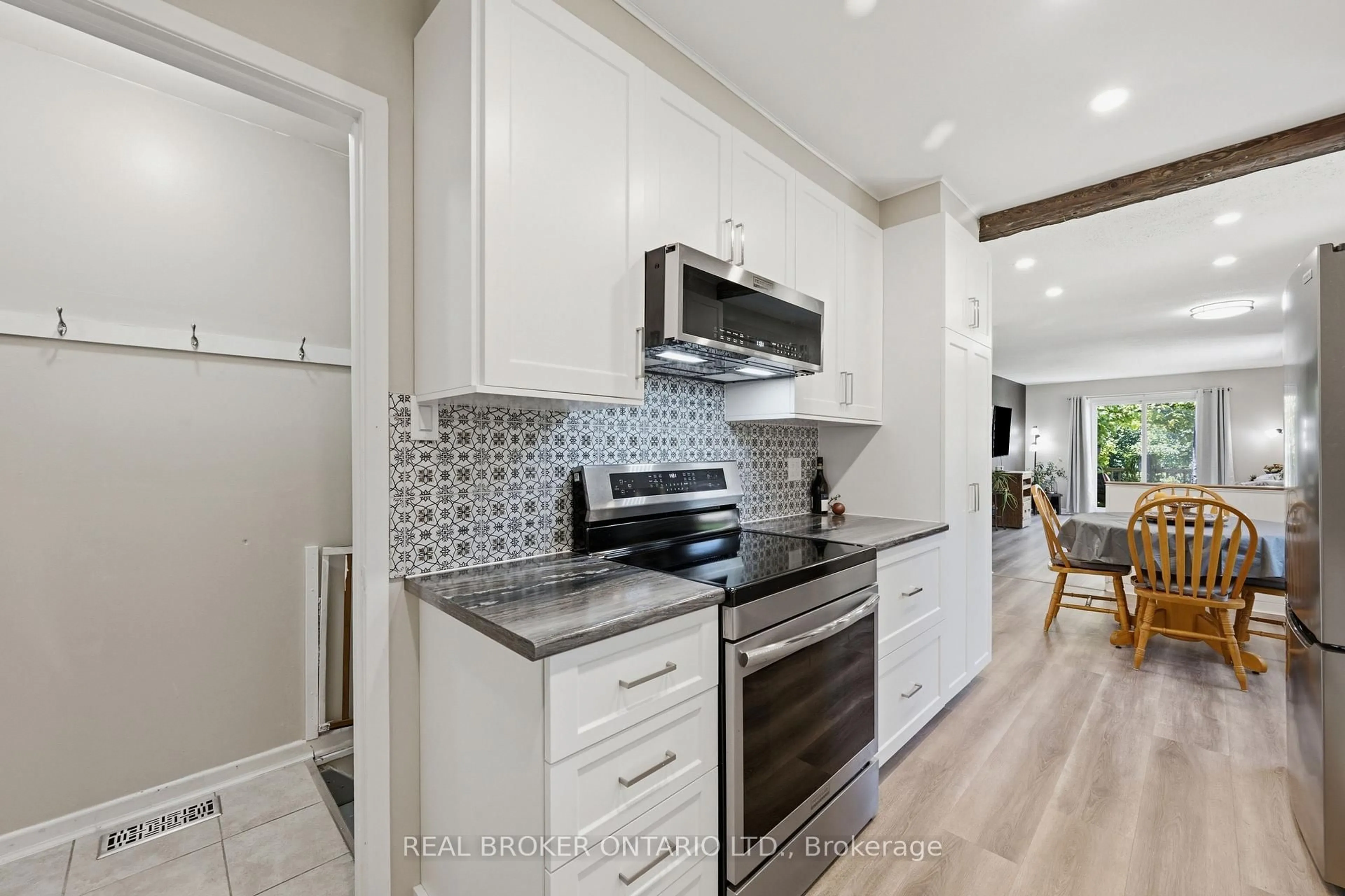 Open concept kitchen, ceramic/tile floor for 206 Weedmark Rd, Merrickville-Wolford Ontario K0G 1N0
