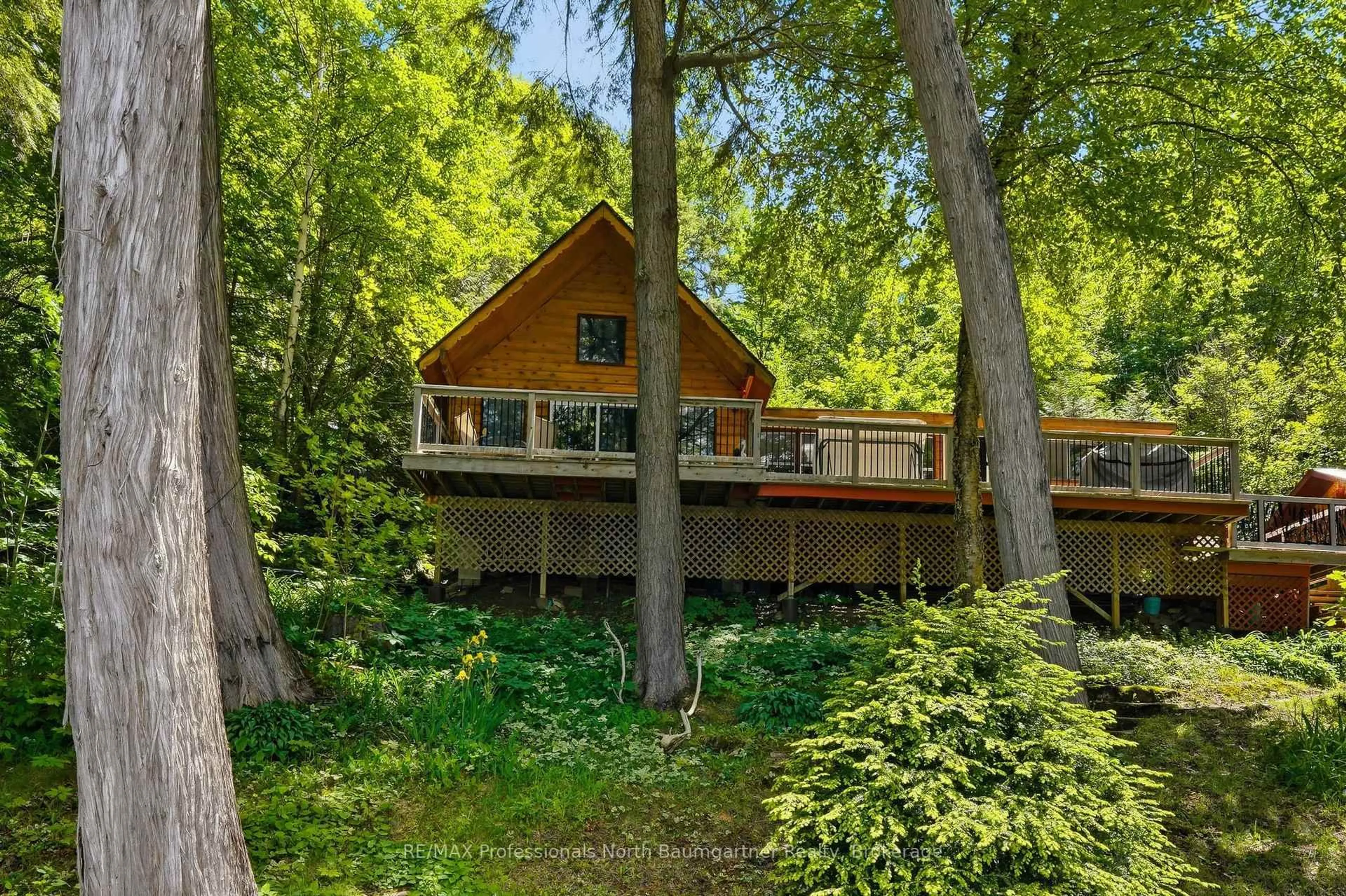A pic from outside/outdoor area/front of a property/back of a property/a pic from drone, forest/trees view for 1093 Corylus Lane, Dysart et al Ontario K0M 1S0