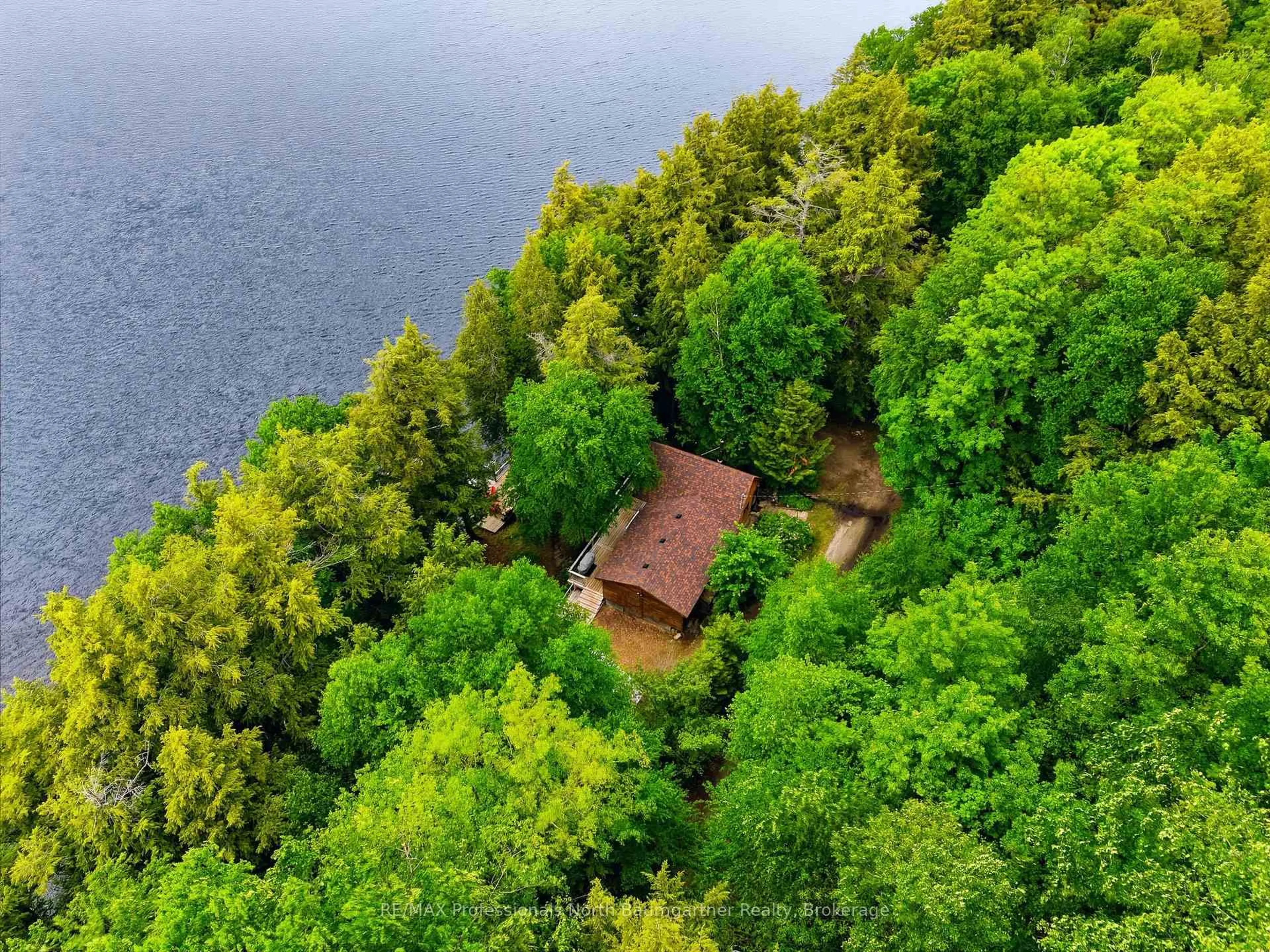 A pic from outside/outdoor area/front of a property/back of a property/a pic from drone, water/lake/river/ocean view for 1093 Corylus Lane, Dysart et al Ontario K0M 1S0