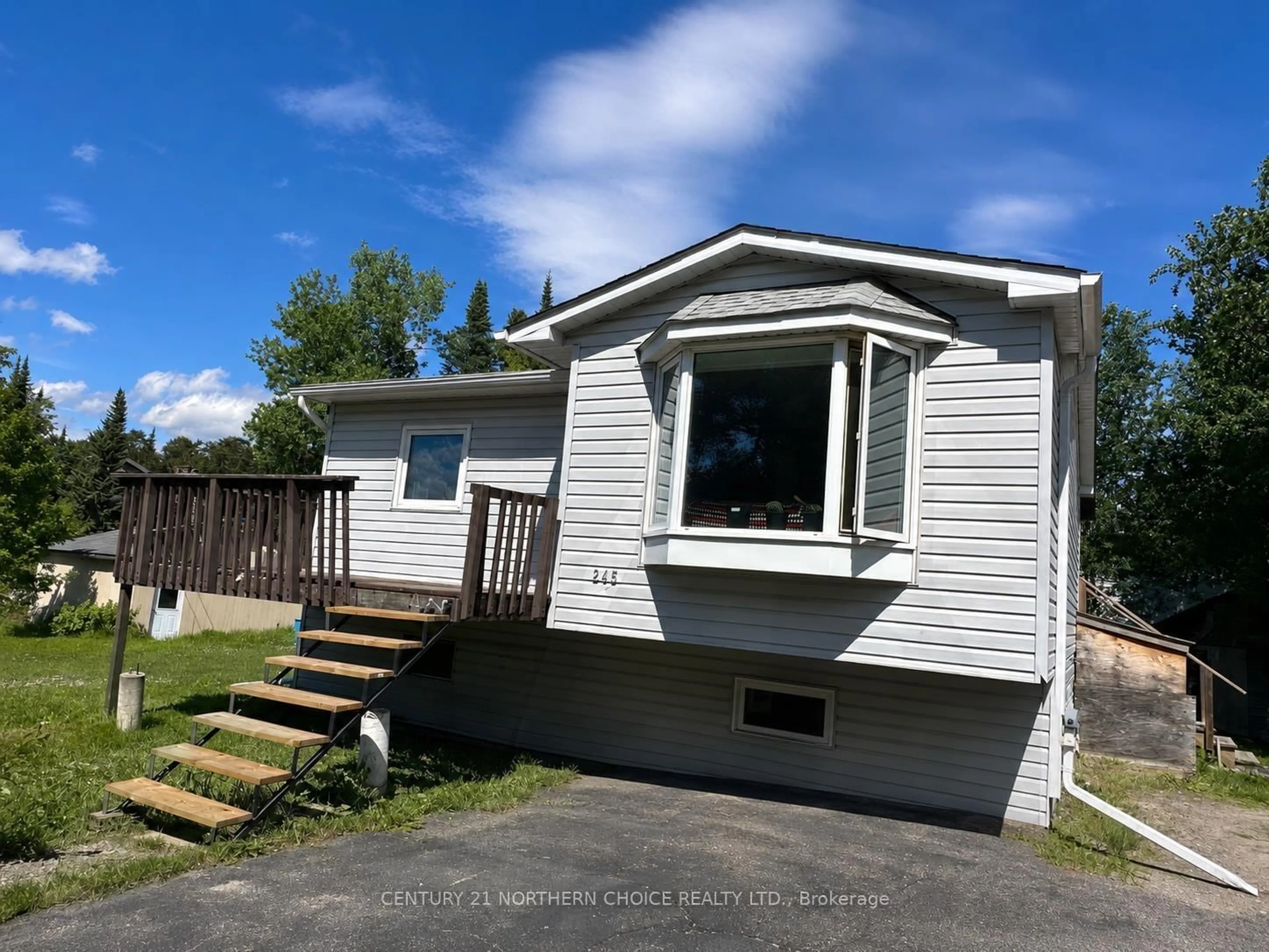 Home with vinyl exterior material, street for 245 Hammell Rd, Red Lake Ontario P0V 2M0