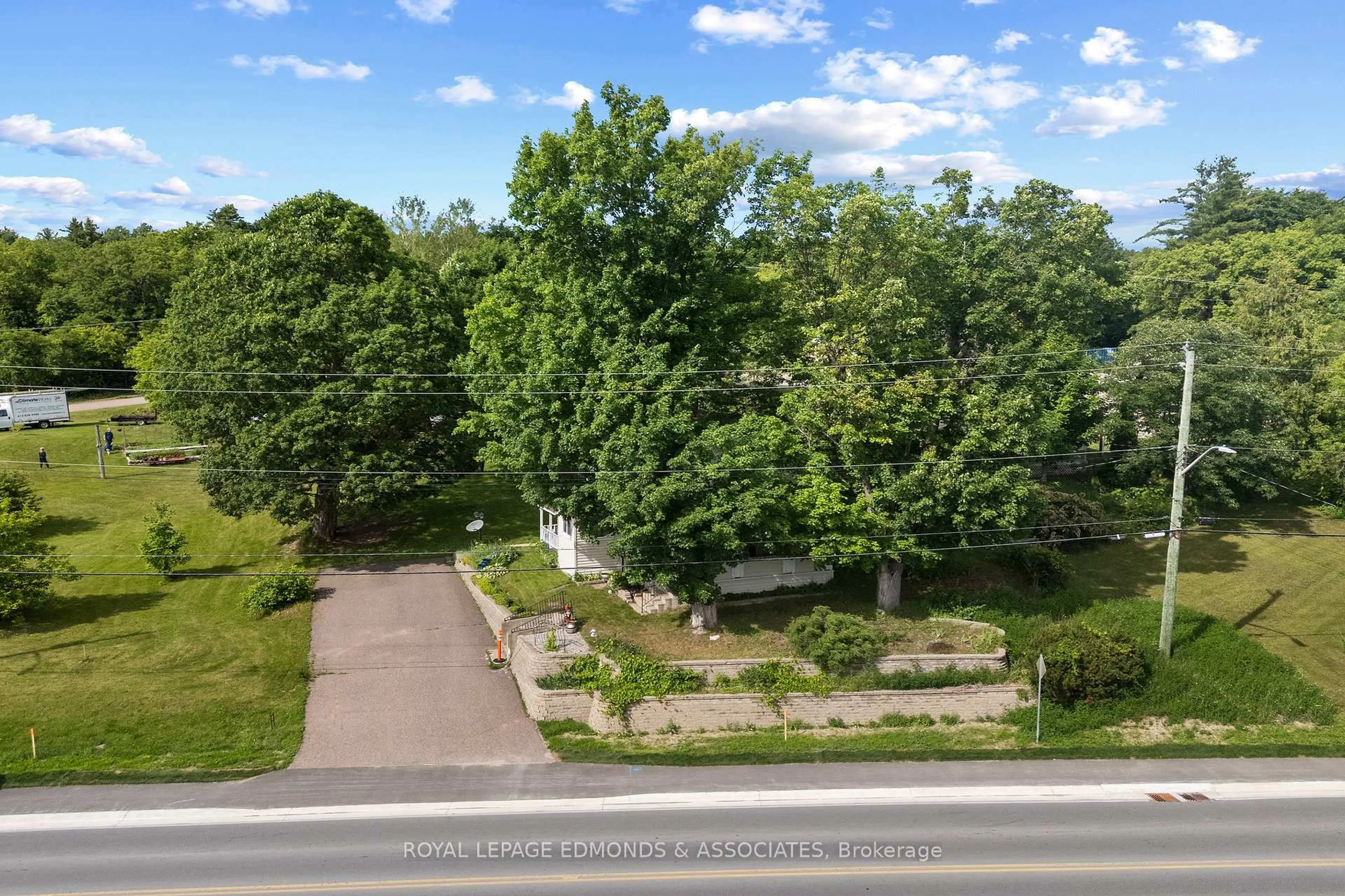 A pic from outside/outdoor area/front of a property/back of a property/a pic from drone, forest/trees view for 138 Bonnechere St, Bonnechere Valley Ontario K7V 1Z5