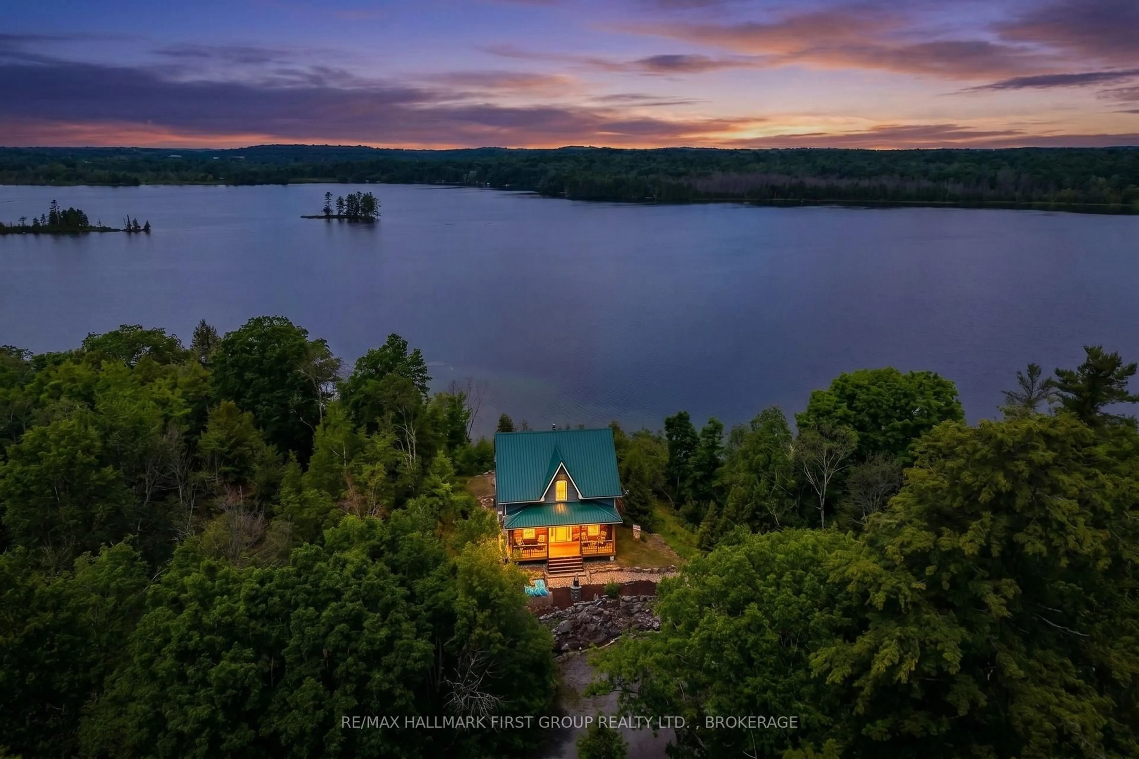 A pic from outside/outdoor area/front of a property/back of a property/a pic from drone, water/lake/river/ocean view for 812 Buck Hollow Lane, Leeds and the Thousand Islands Ontario K0E 1N0
