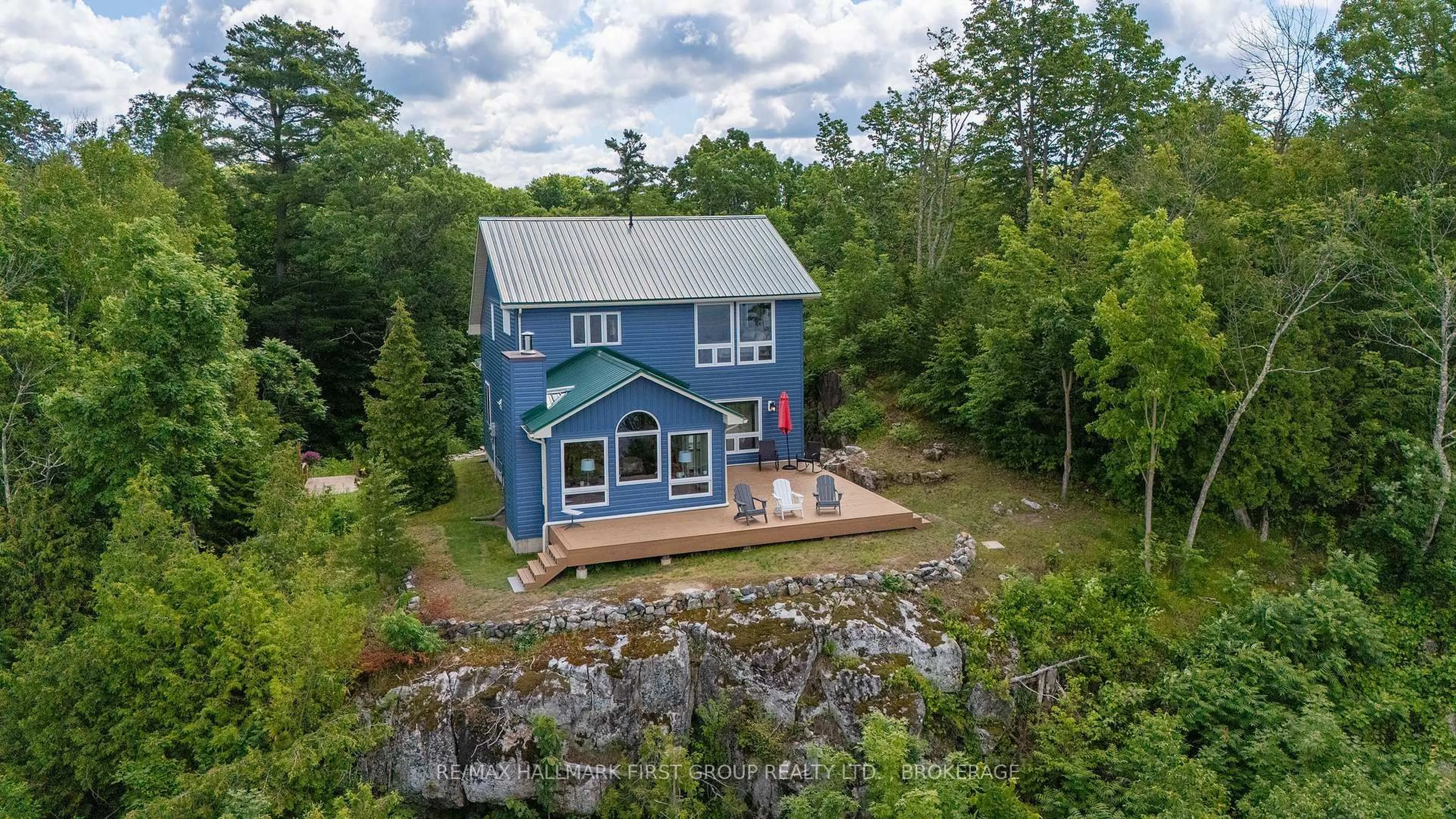 A pic from outside/outdoor area/front of a property/back of a property/a pic from drone, water/lake/river/ocean view for 812 Buck Hollow Lane, Leeds and the Thousand Islands Ontario K0E 1N0