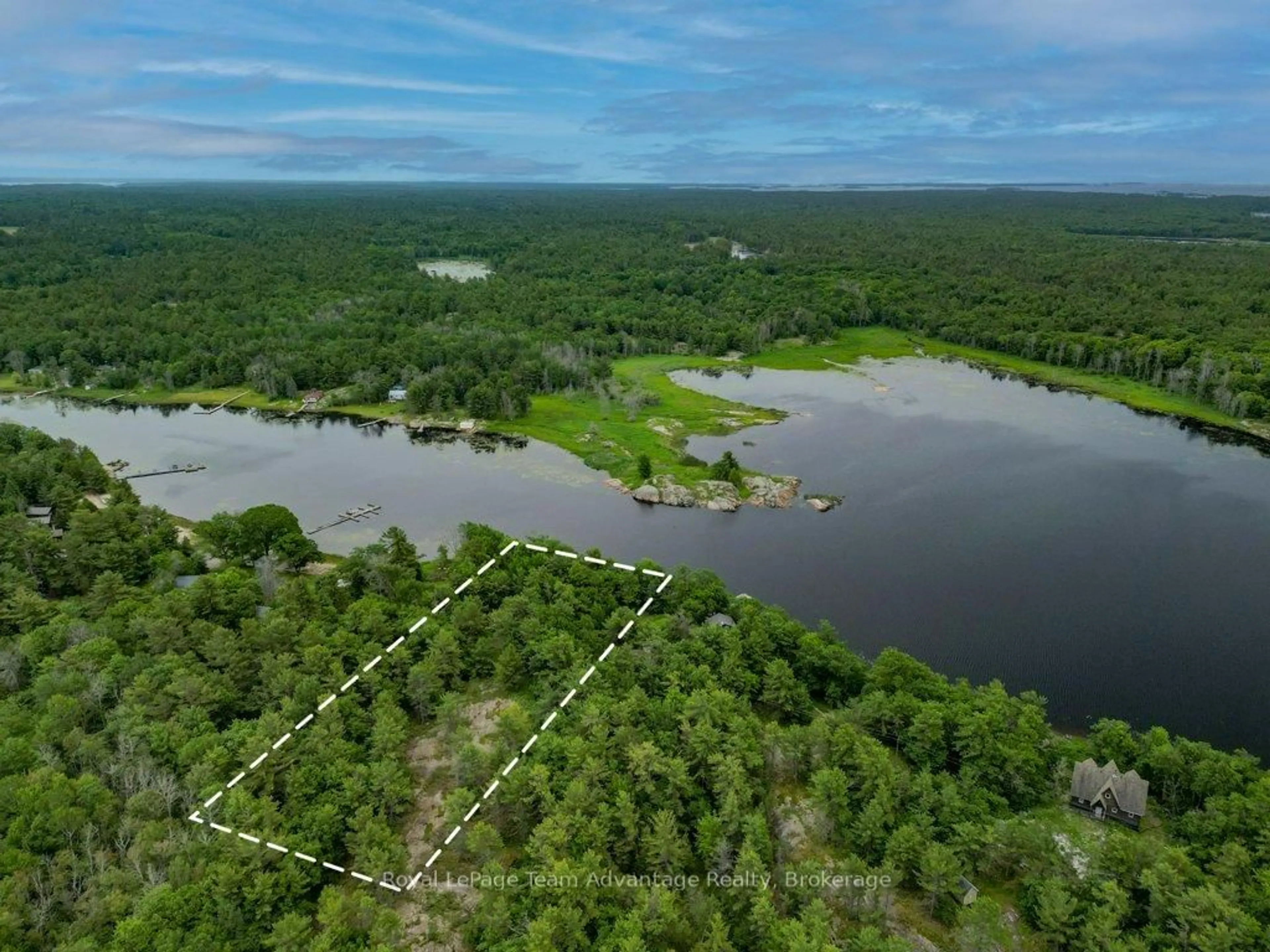 A pic from outside/outdoor area/front of a property/back of a property/a pic from drone, water/lake/river/ocean view for 3 Poachers Pt, Carling Ontario P0G 1G0
