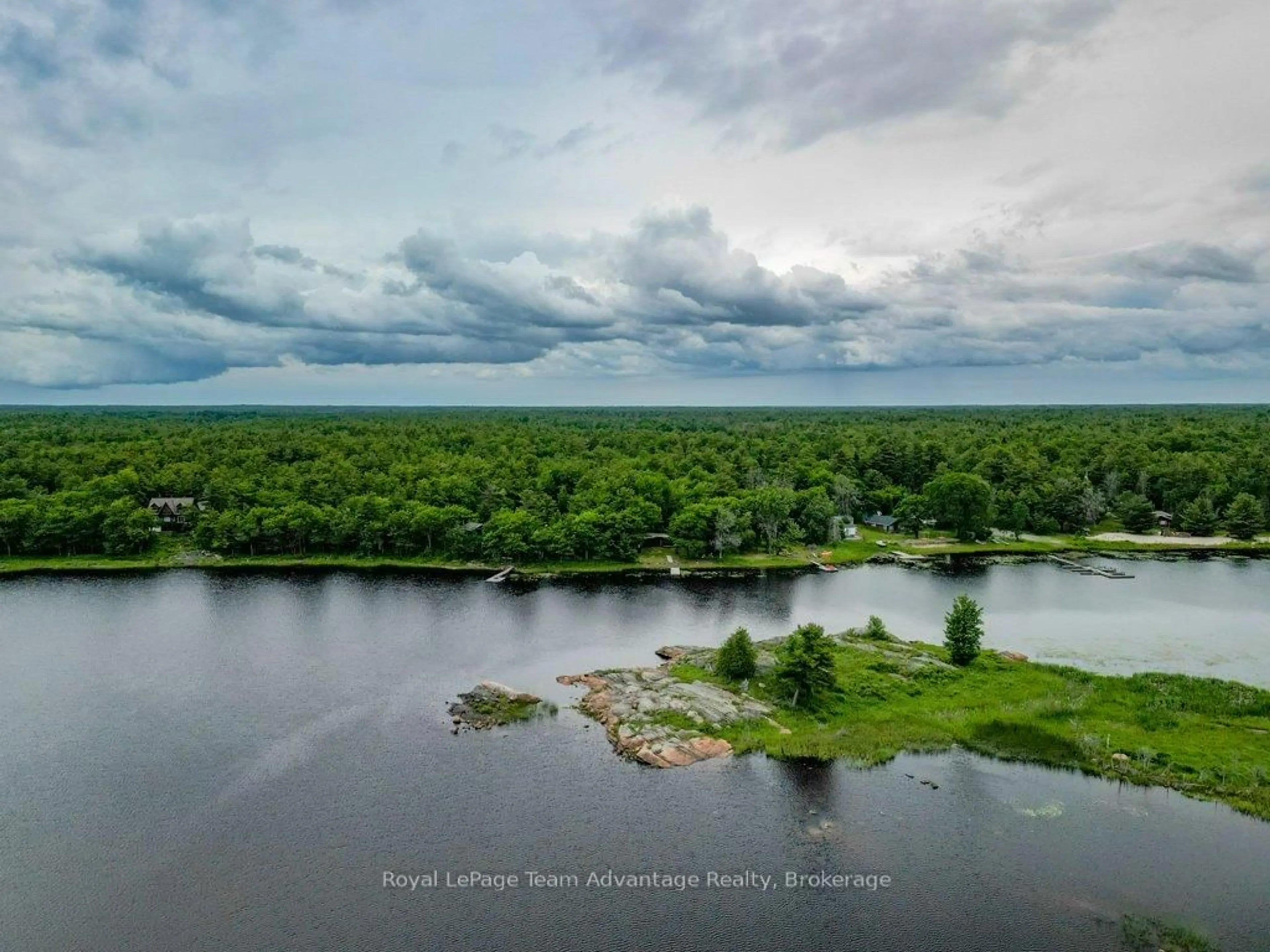 A pic from outside/outdoor area/front of a property/back of a property/a pic from drone, water/lake/river/ocean view for 3 Poachers Pt, Carling Ontario P0G 1G0