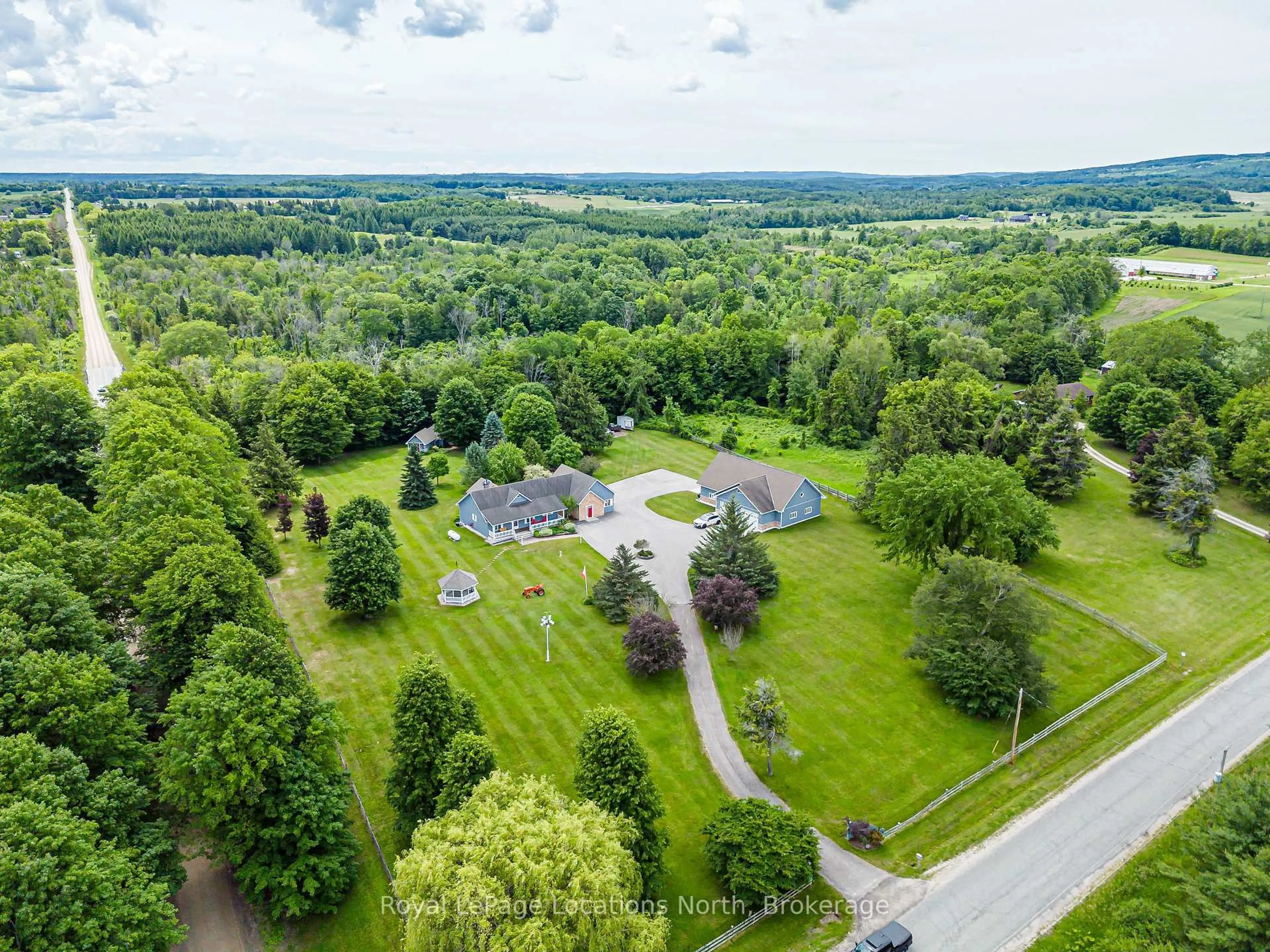 A pic from outside/outdoor area/front of a property/back of a property/a pic from drone, unknown for 828530 Mulmur-Nottawasaga Townline, Mulmur Ontario L9Y 0Y9