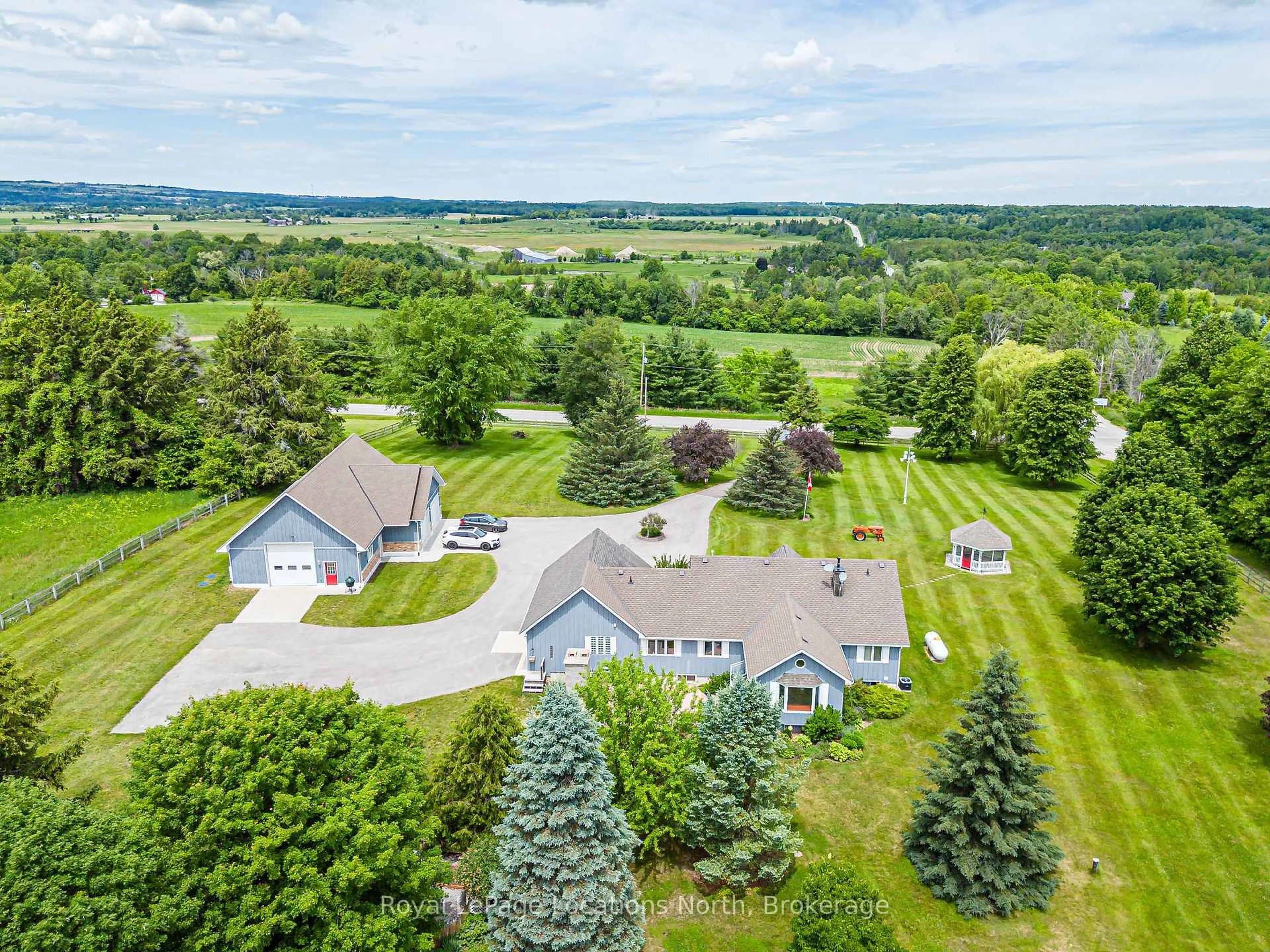 A pic from outside/outdoor area/front of a property/back of a property/a pic from drone, water/lake/river/ocean view for 828530 Mulmur-Nottawasaga Townline, Mulmur Ontario L9Y 0Y9