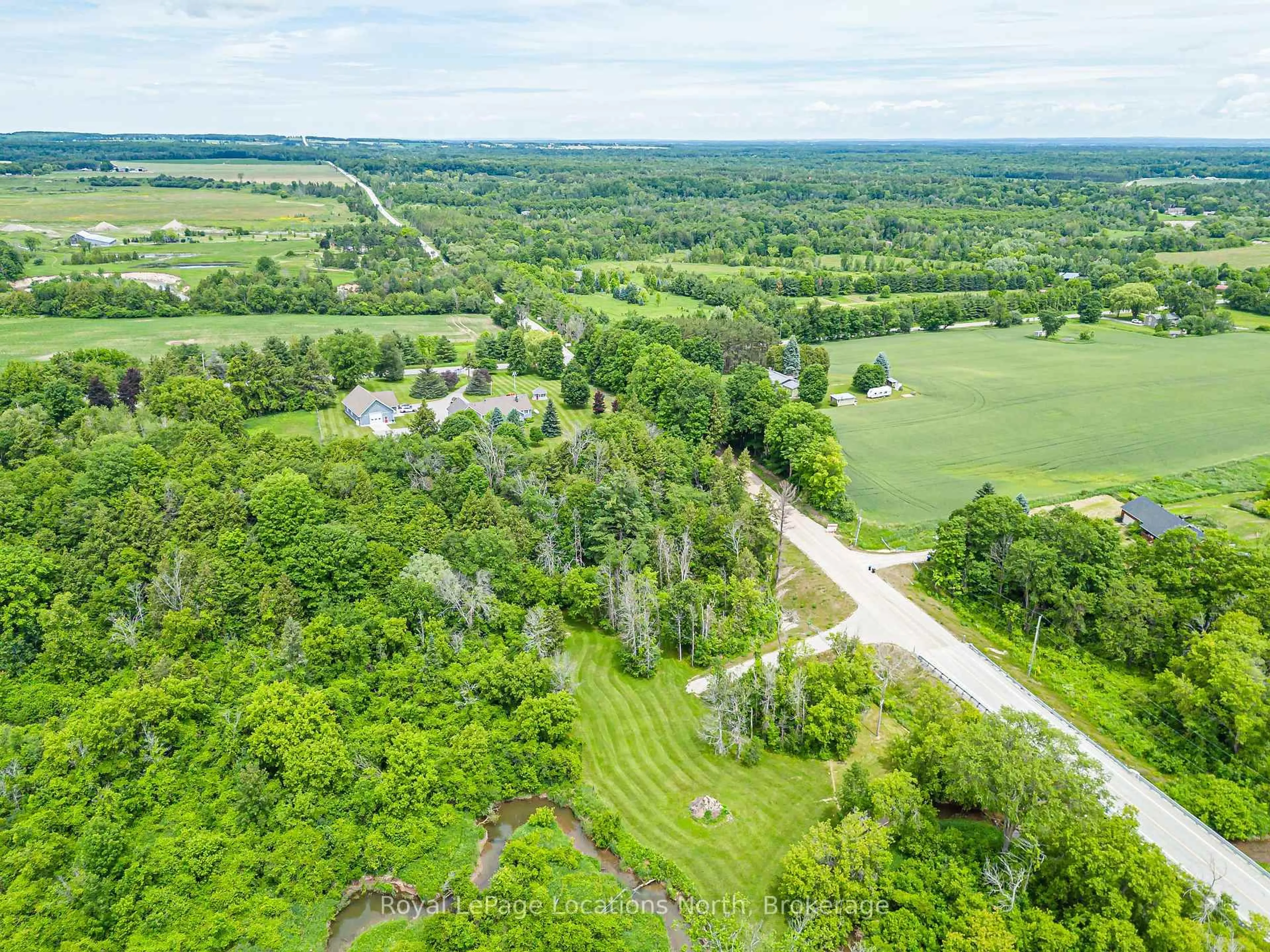 A pic from outside/outdoor area/front of a property/back of a property/a pic from drone, forest/trees view for 828530 Mulmur-Nottawasaga Townline, Mulmur Ontario L9Y 0Y9