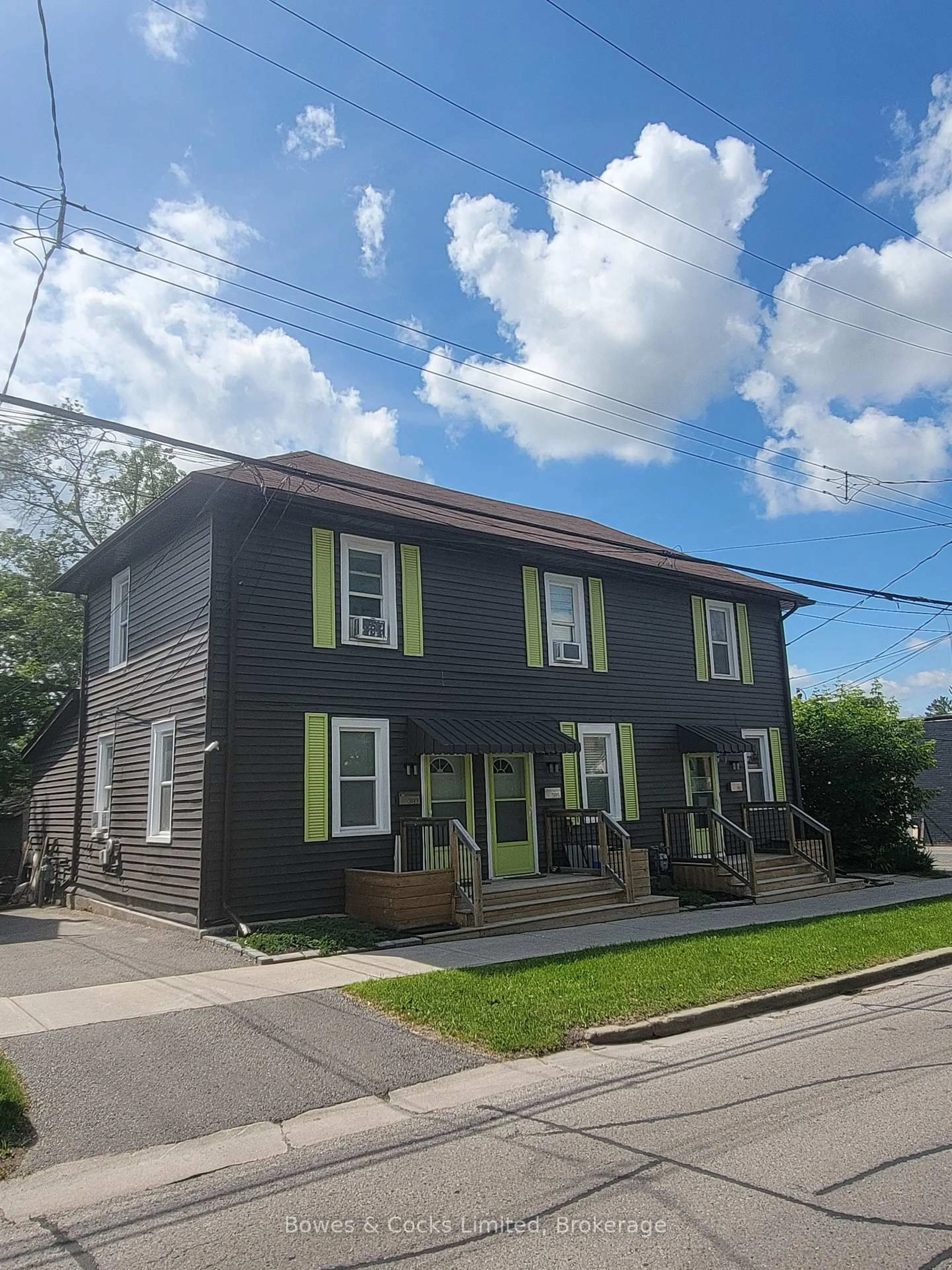 Home with vinyl exterior material, street for 383-387 Mark St, Peterborough Ontario K9H 1V8