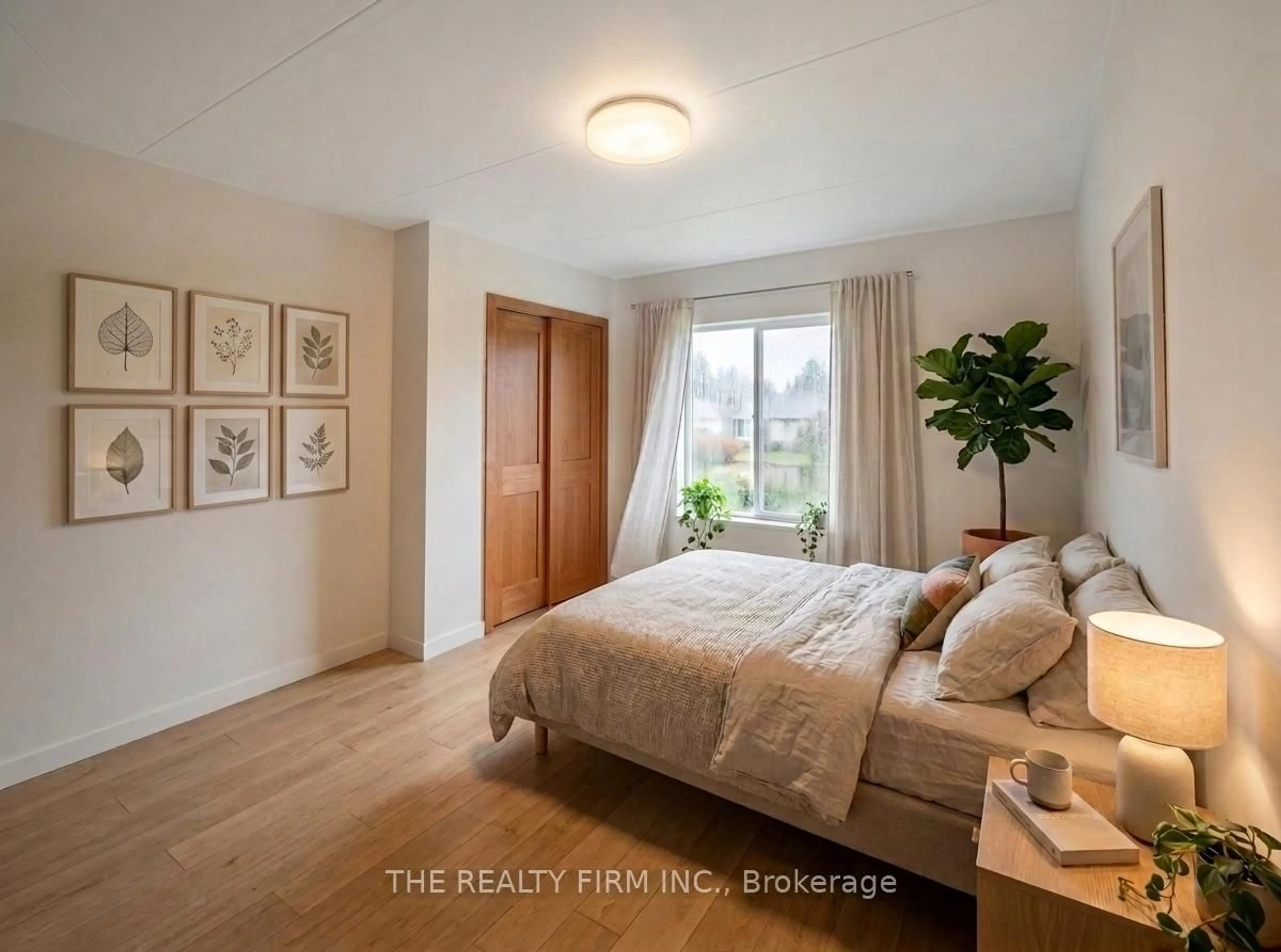 Bedroom with bed, wood/laminate floor for 1236 Southdale Rd, London South Ontario N6E 1B4