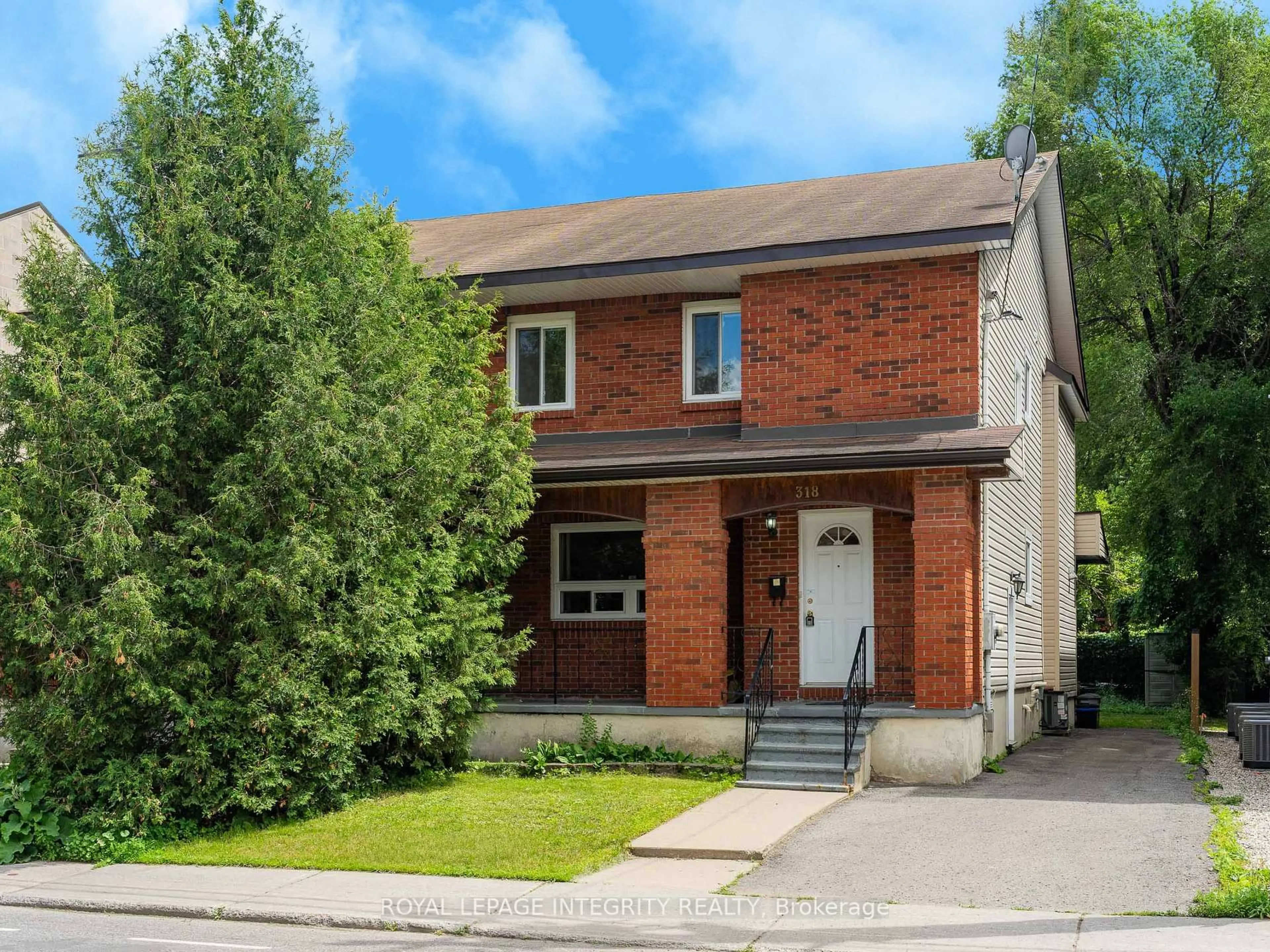 Home with brick exterior material, street for 318 Somerset St, Ottawa Ontario K1N 6W3
