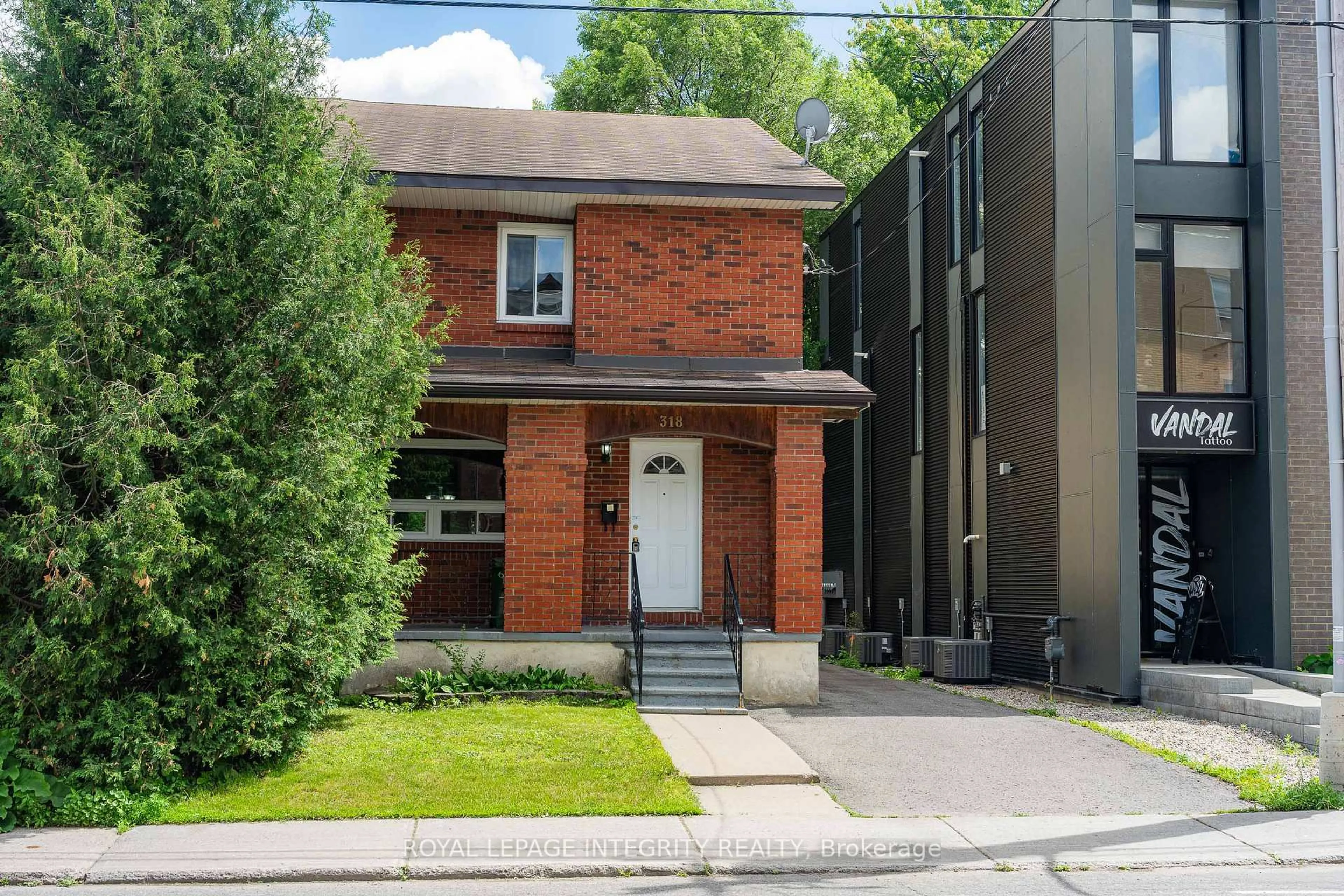 Home with brick exterior material, street for 318 Somerset St, Ottawa Ontario K1N 6W3