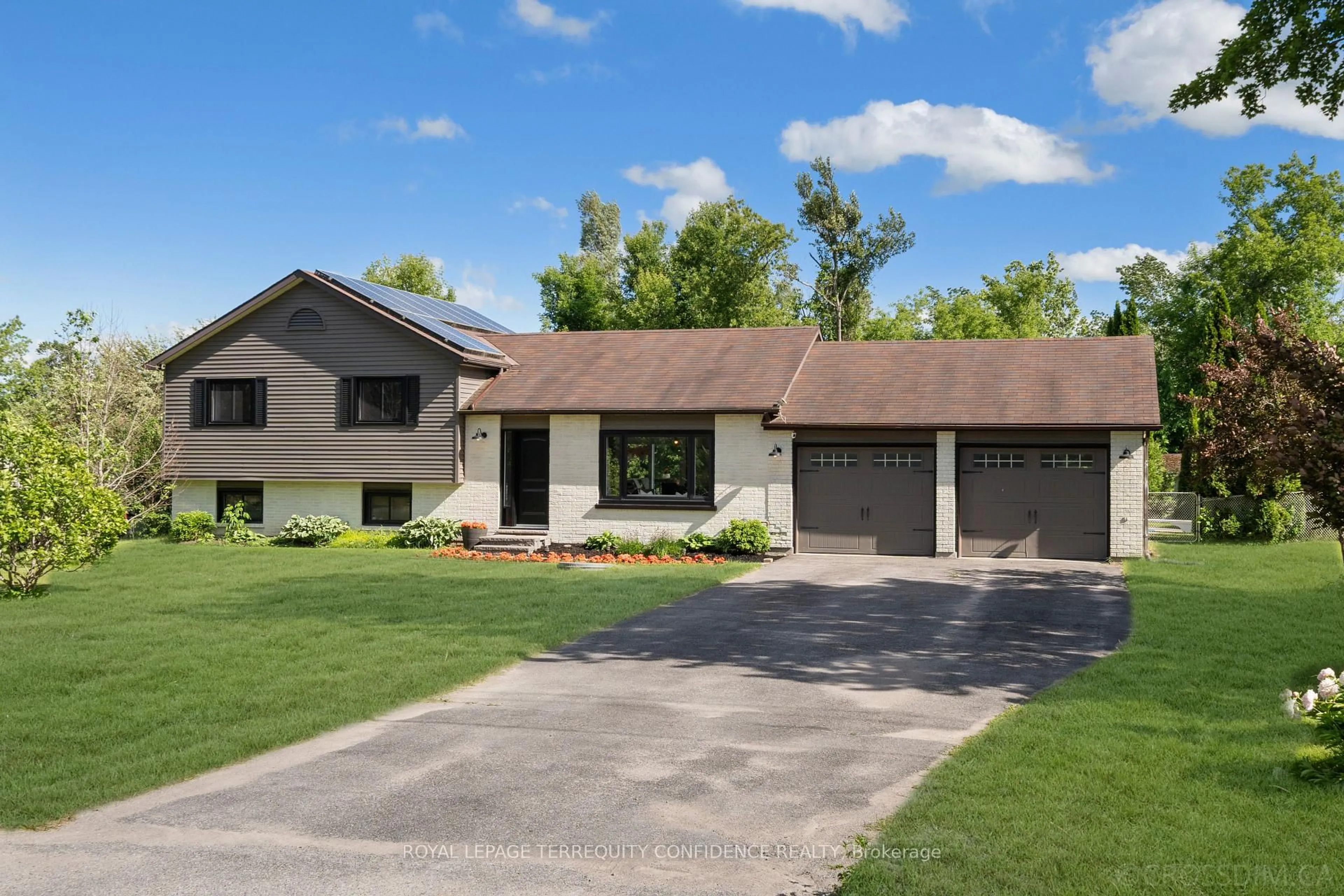 Home with vinyl exterior material, street for 1427 Stewart Line, Cavan Monaghan Ontario L0A 1C0