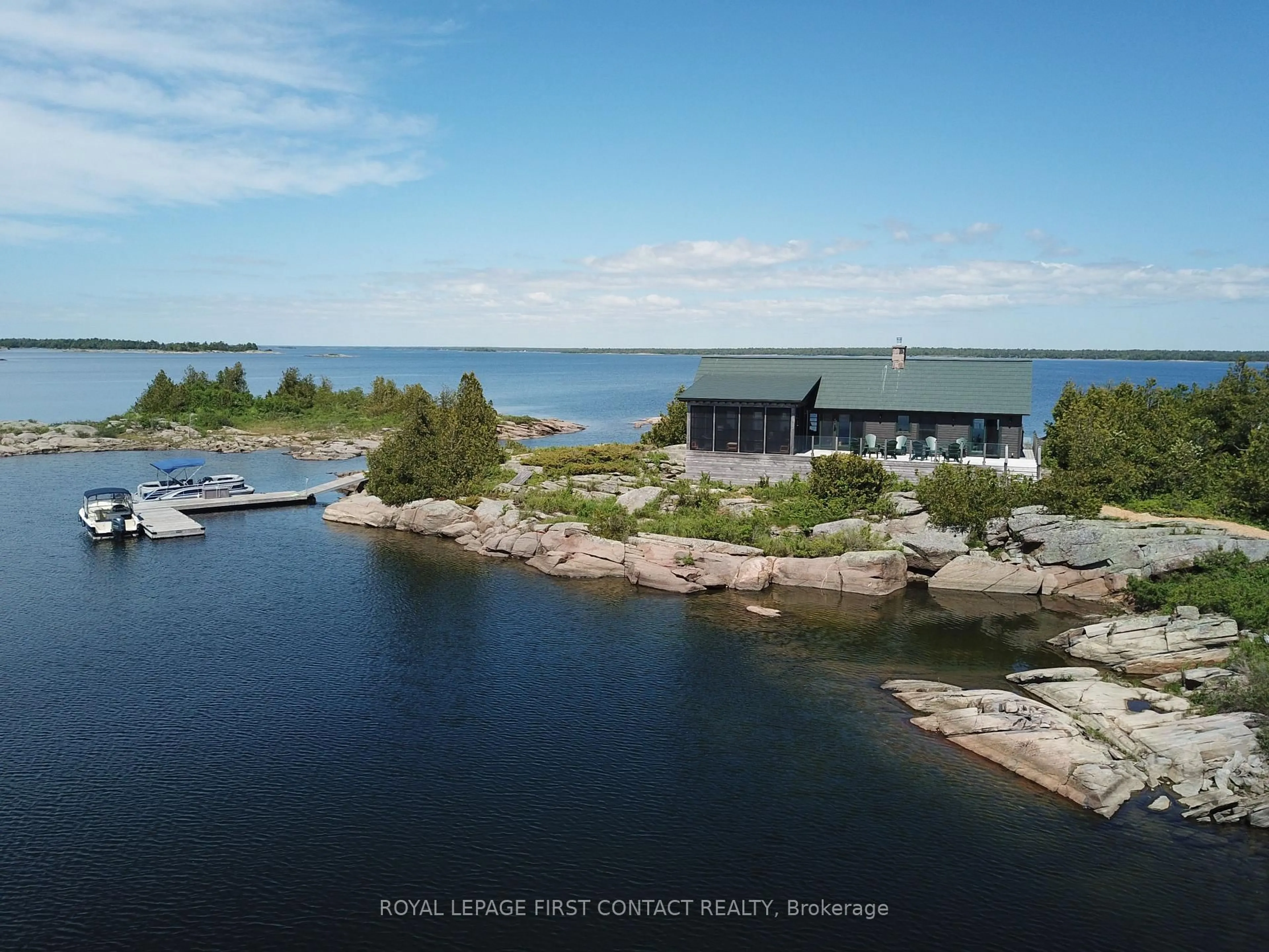 A pic from outside/outdoor area/front of a property/back of a property/a pic from drone, water/lake/river/ocean view for 1 B731 Island, The Archipelago Ontario P0G 1K0